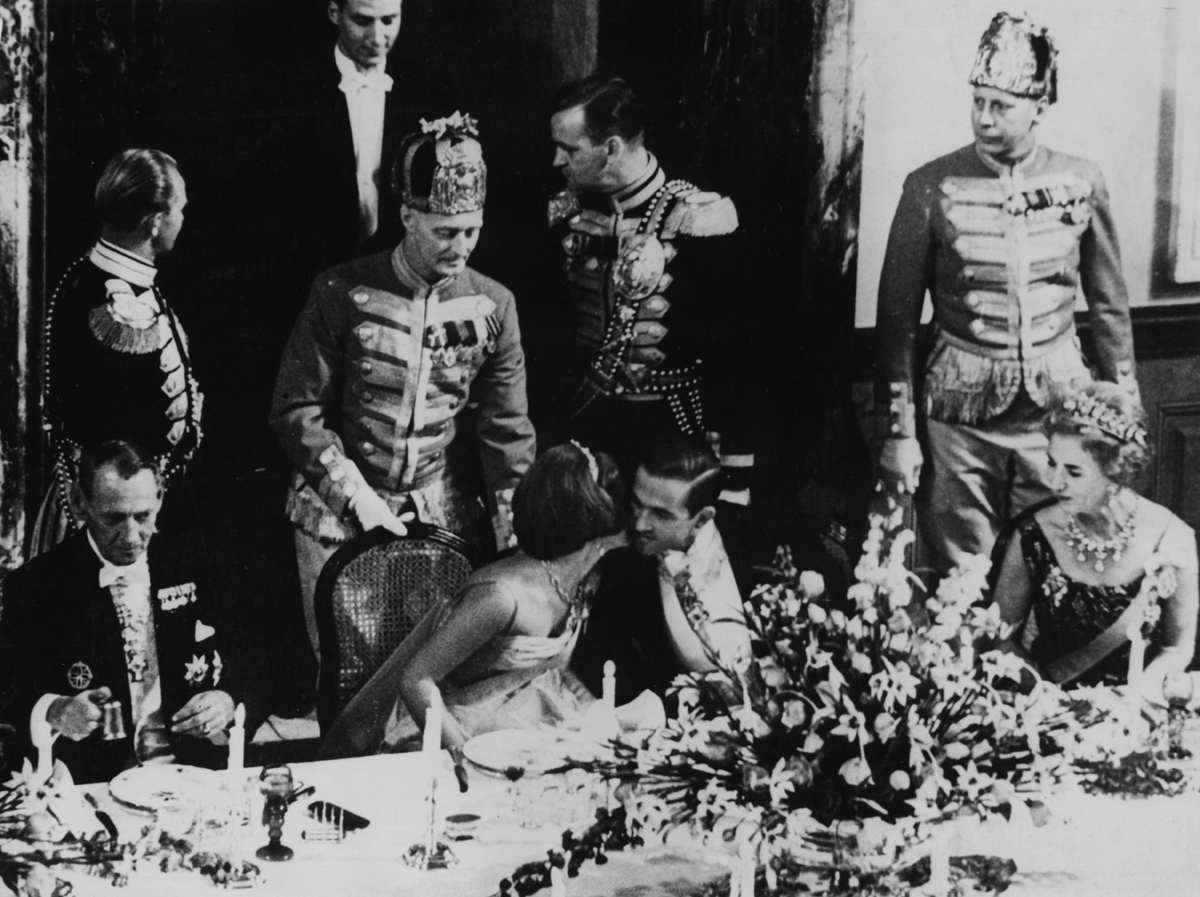 Princess Anne-Marie of Denmark kisses King Constantine II of the Hellenes during a farewell dinner given in her honor at Fredensborg Palace in Denmark on September 10, 1964 (Keystone/Hulton Archive/Getty Images)