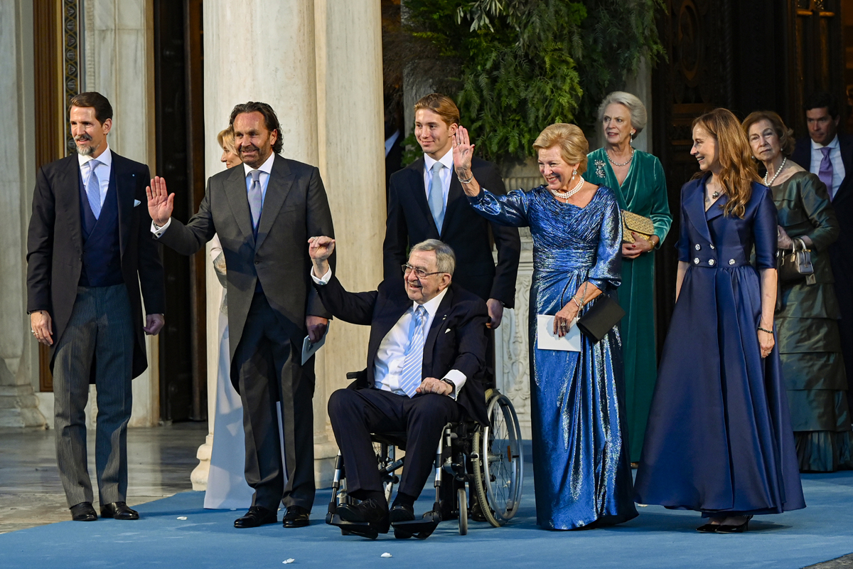 King Constantine II and Queen Anne-Marie, with members of their family, celebrate the wedding of their youngest son, Prince Philippos, at the Metropolitan Cathedral in Athens on October 23, 2021 (Milos Bicanski/Getty Images)