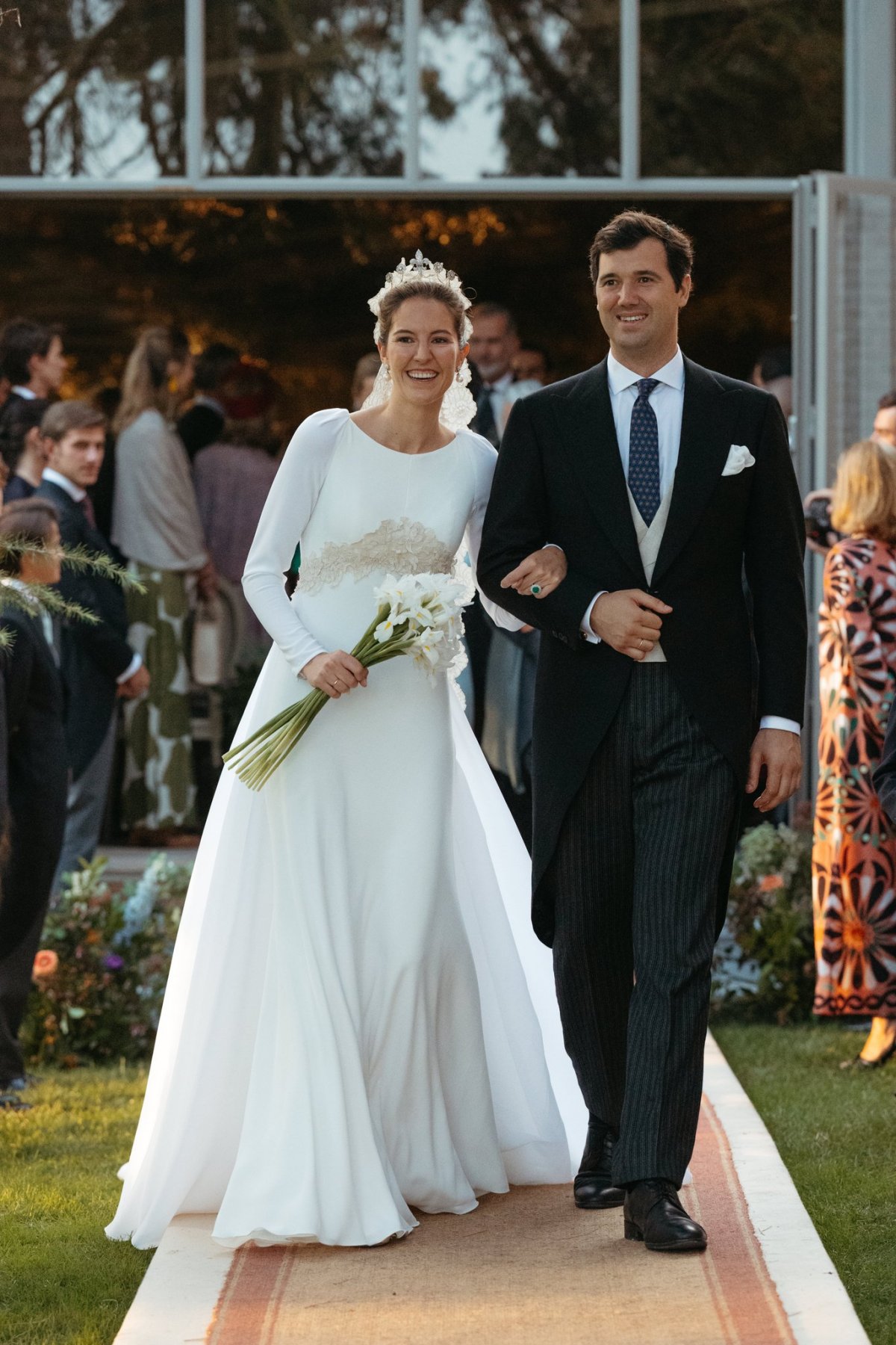 Victoria López-Quesada y Bourbon-Two Sicilies and Enrique Moreno de la Cova Ybarra are pictured on their wedding day in Algete, Spain on August 31, 2024 (Casa Real/Bibiana Fierro)