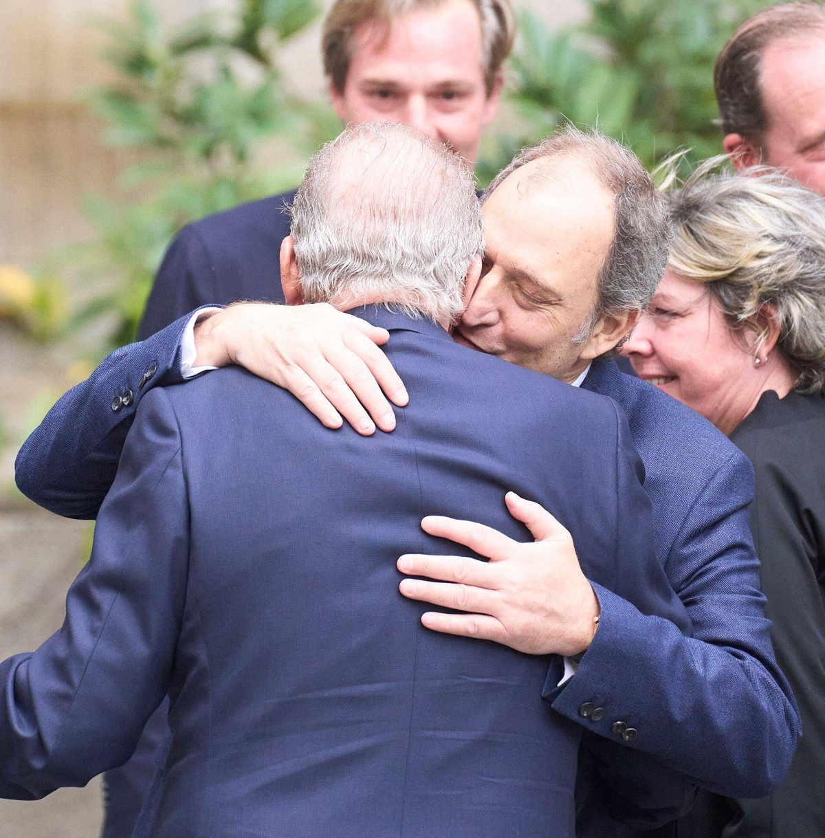 Juan Gomez Acebo embraces his uncle, King Juan Carlos of Spain, ahead of a mass celebrating the life of Fernando Gomez Acebo in Madrid on April 8, 2024 (MPG/Alamy)