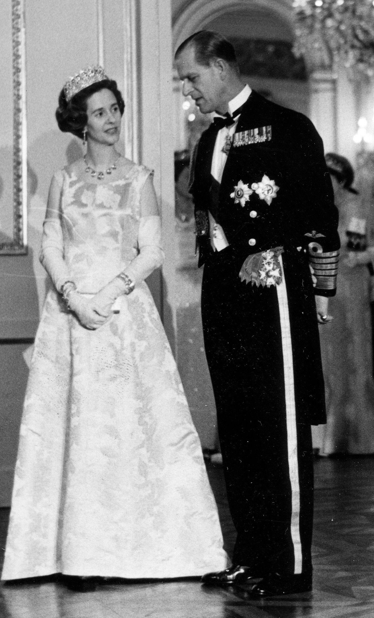 The Queen of the Belgians and the Duke of Edinburgh attend a state banquet at the Royal Palace in Brussels on May 9, 1966 (Belga News Agency/Alamy)