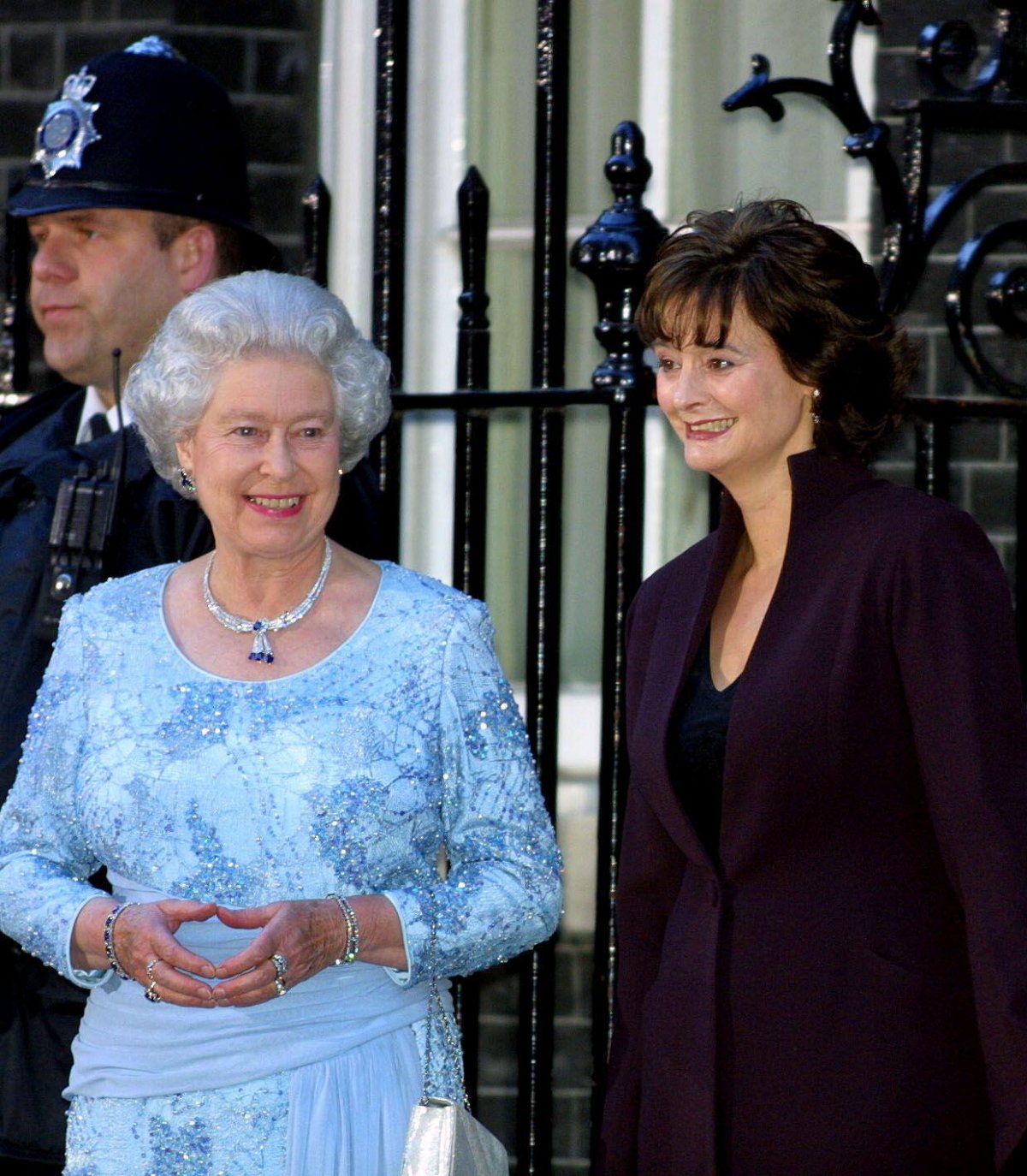 Queen Elizabeth II, with Cherie Blair, poses outside 10 Downing Street ahead of a dinner celebrating the monarch's Golden Jubilee on April 29, 2002 (Peter Jordan/PA Images/Alamy)