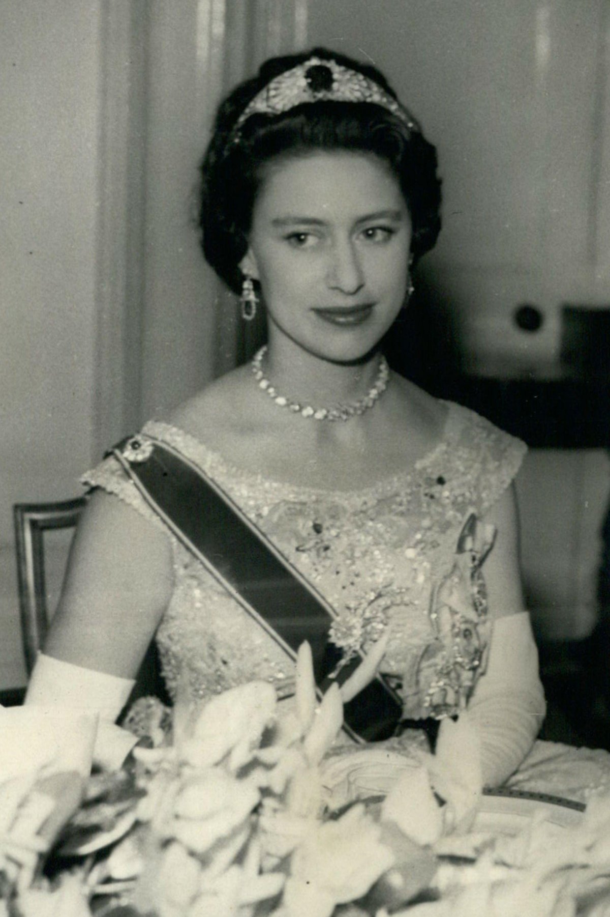 Princess Margaret of the United Kingdom attends a banquet in Trinidad, April 1958 (Keystone Press/Alamy)