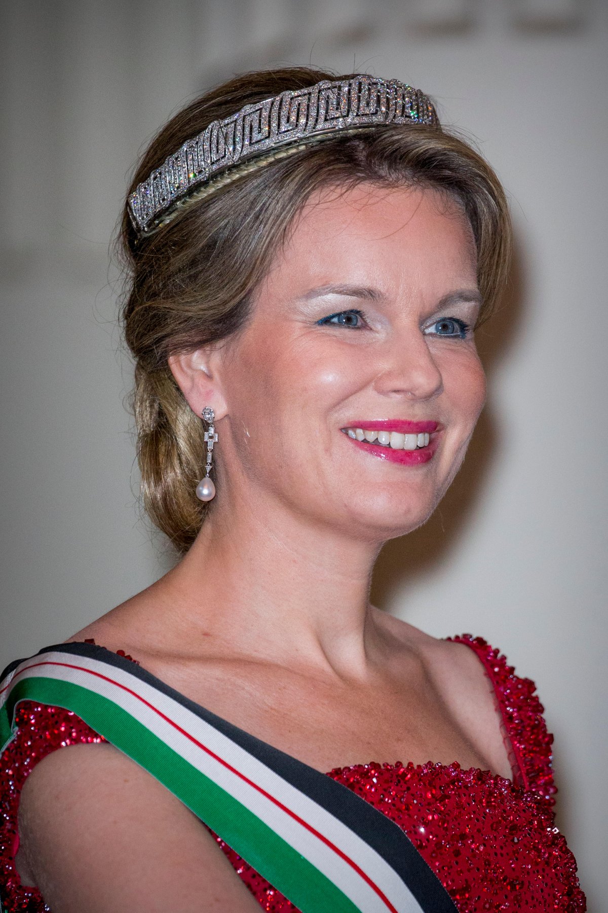The Queen of the Belgians attends a state banquet honoring the visiting King and Queen of Jordan at the Palace of Laeken on May 18, 2016 (Patrick van Katwijk/DPA Picture Alliance/Alamy)