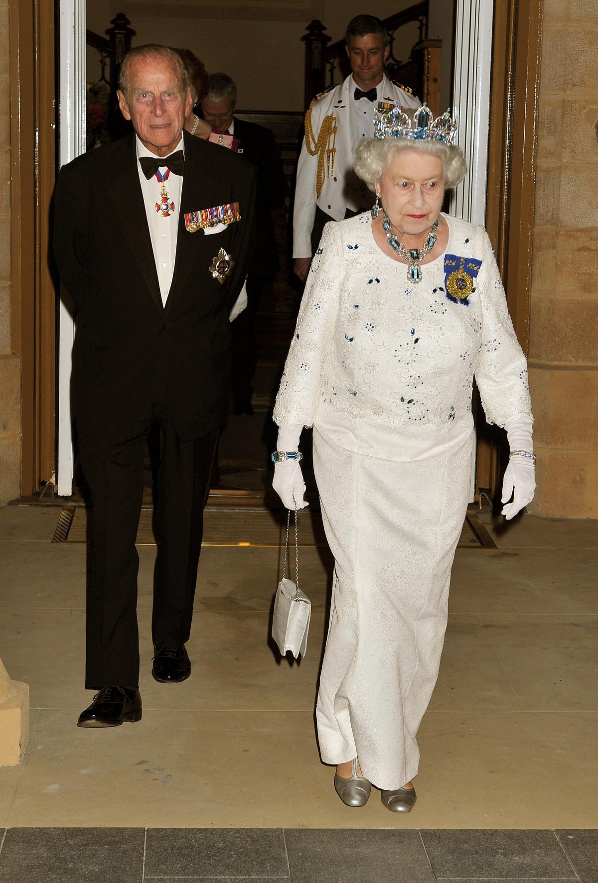 Queen Elizabeth II and Prince Philip attend a banquet for Commonwealth leaders at the Pan Pacific Hotel in Perth, Australia, on October 28, 2011 (John Stillwell/PA Images/Alamy)