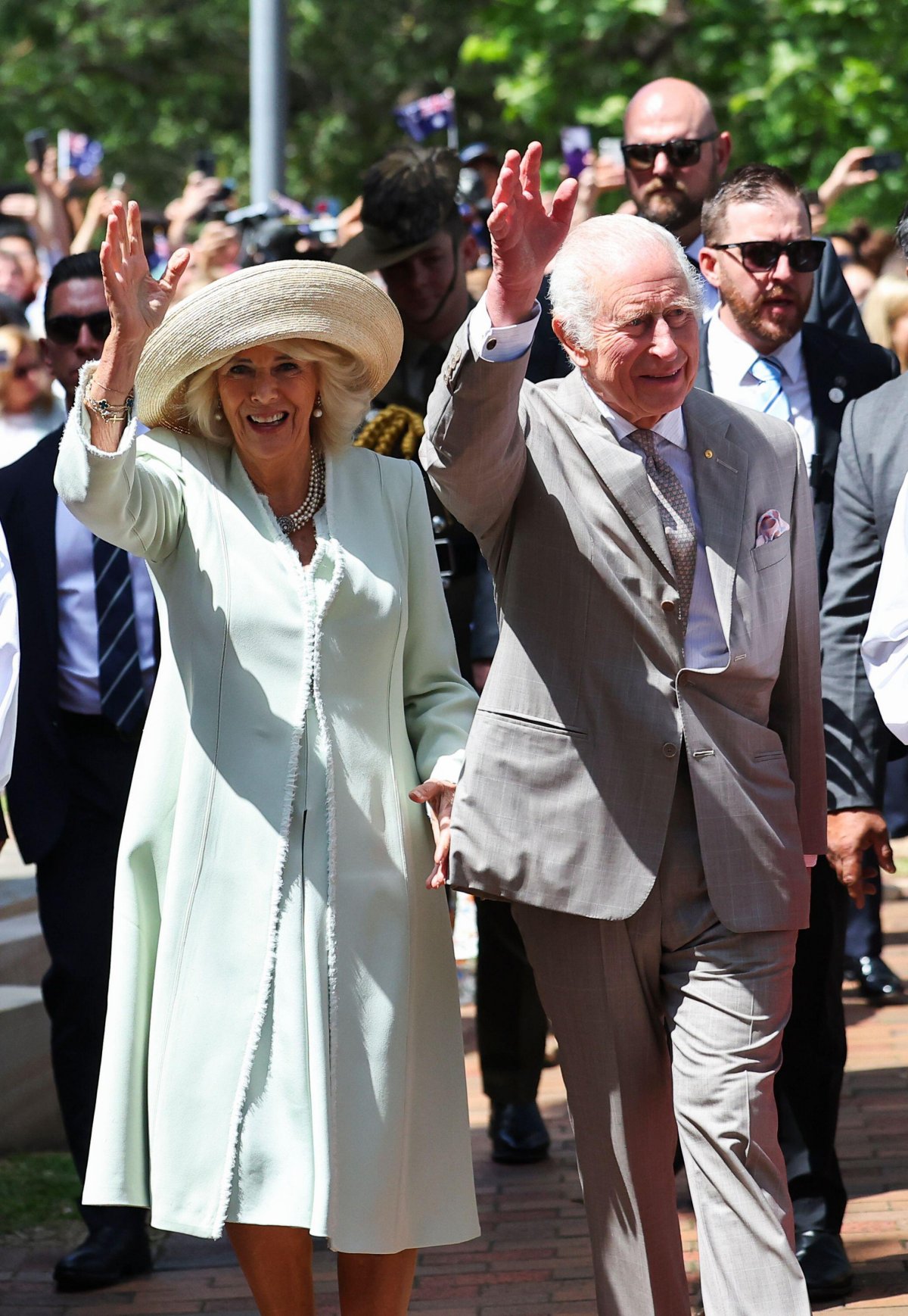King Charles III and Queen Camilla are pictured after attending a service at St Thomas' Anglican Church in North Sydney on October 20, 2024 (Toby Melville/PA Images/Alamy)