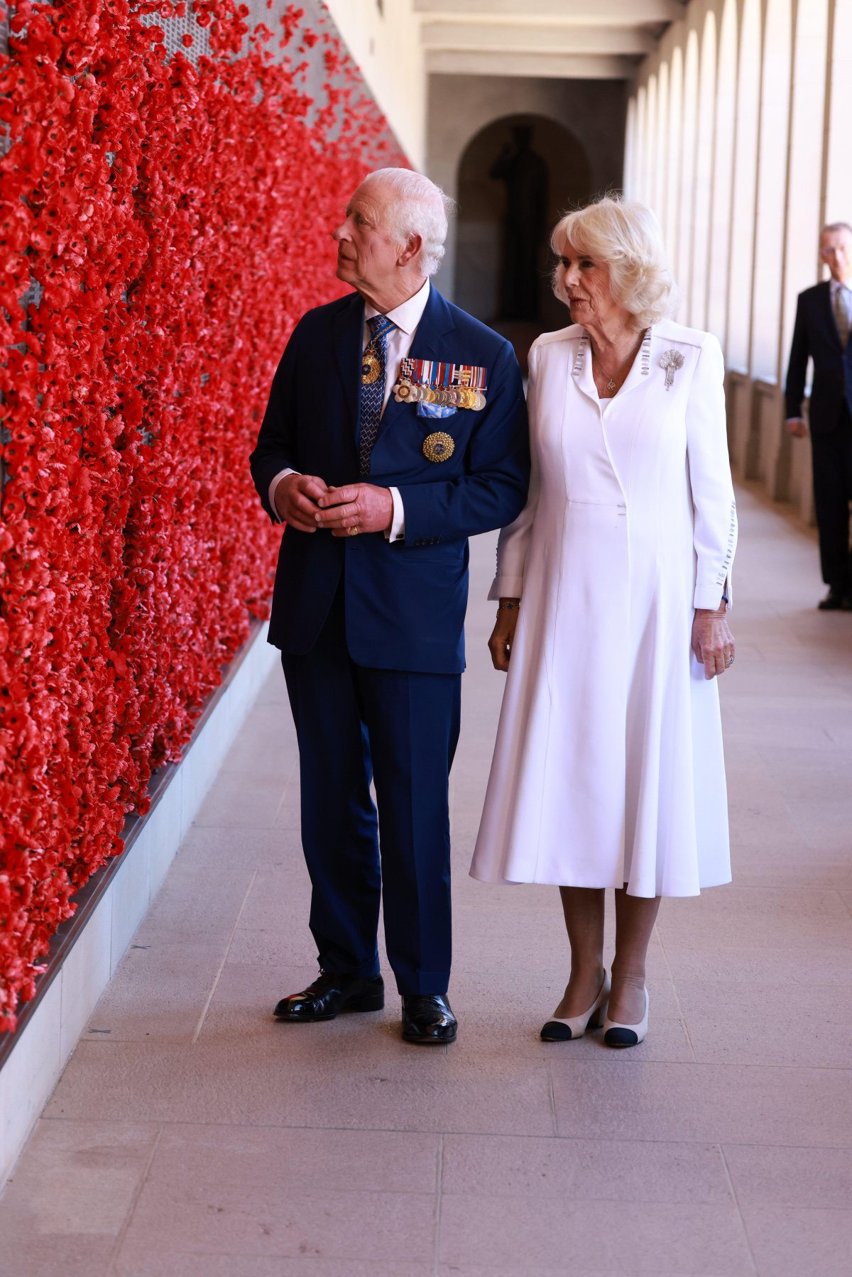 King Charles III and Queen Camilla view the Wall of Remembrance during a visit to the Australian War Memorial in Canberra on October 21, 2024 (Ian Vogler/PA Images/Alamy)