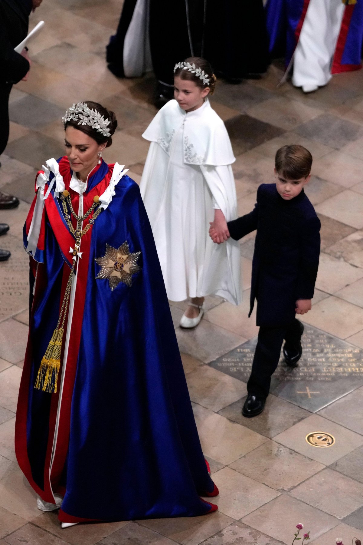 The Princess of Wales, with Princess Charlotte and Prince George, attends the coronation of King Charles III and Queen Camilla at Westminster Abbey in London on May 6, 2023 (Kirsty Wigglesworth/PA Images/Alamy)