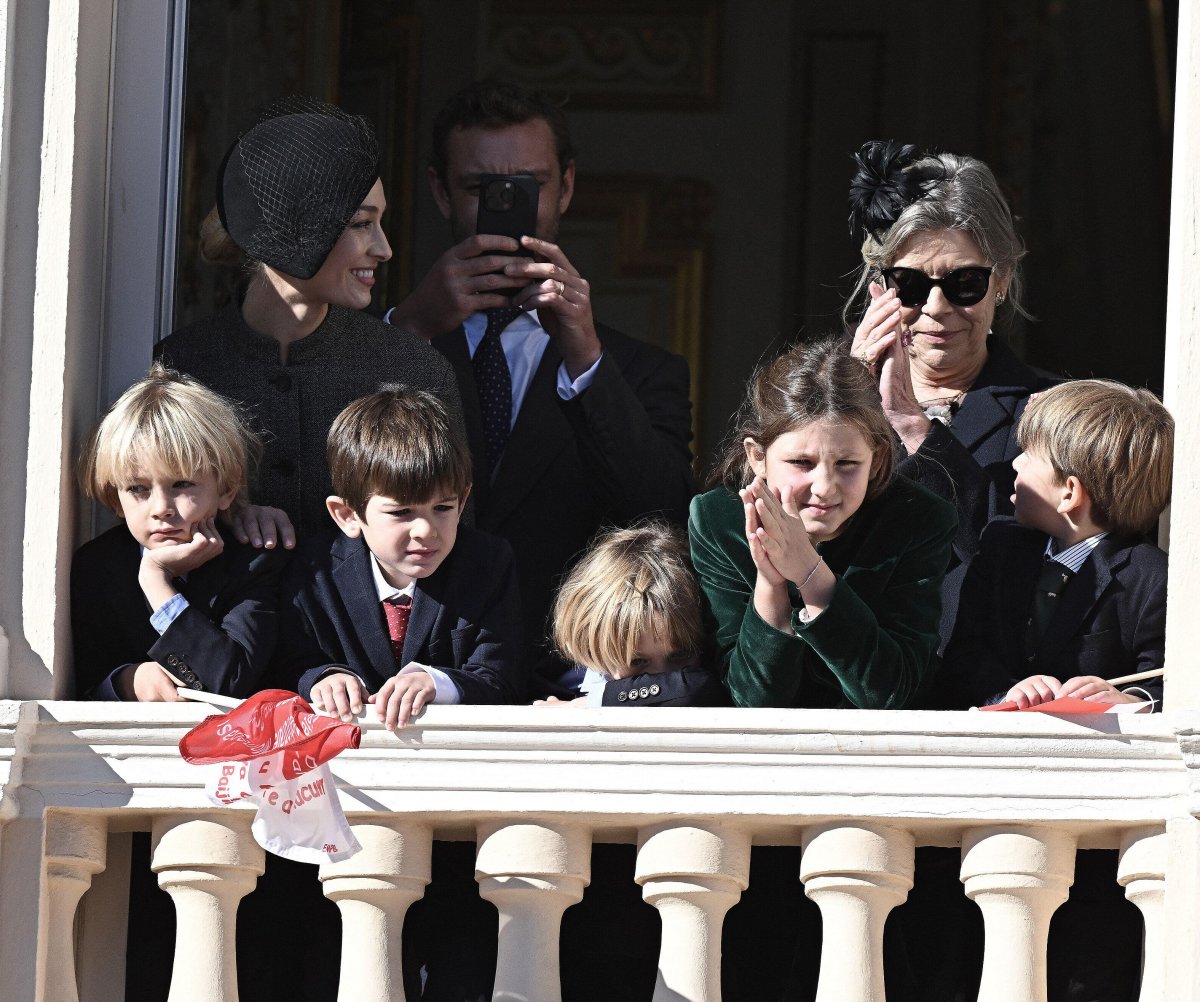 The Princess of Hanover, with several members of her family, watches a military ceremony from a palace balcony during the celebrations of Monaco's National Day on November 19, 2024 (David Niviere/Abaca Press/Alamy)