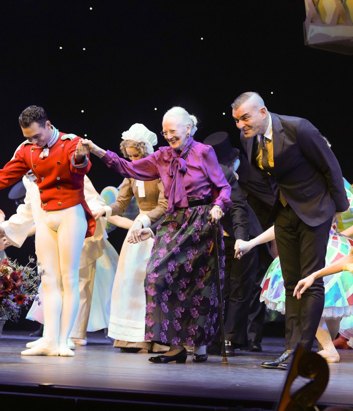 Queen Margrethe of Denmark curtseys alongside the cast and crew of the Nutcracker at Tivoli’s Concert Hall in Copenhagen on November 30, 2024 (Keld Navtoft/Tivoli Gardens)