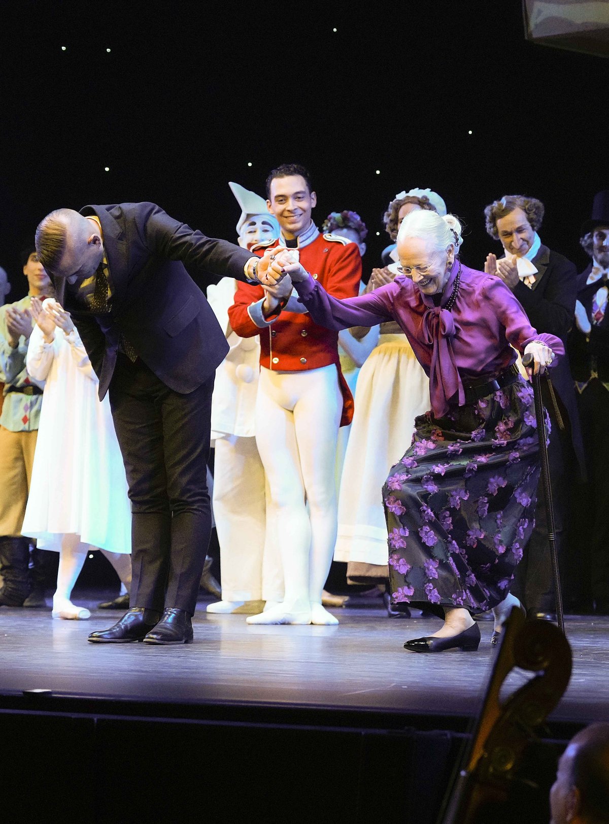 Queen Margrethe of Denmark curtseys alongside the cast and crew of the Nutcracker at Tivoli’s Concert Hall in Copenhagen on November 30, 2024 (Keld Navtoft/Tivoli Gardens)