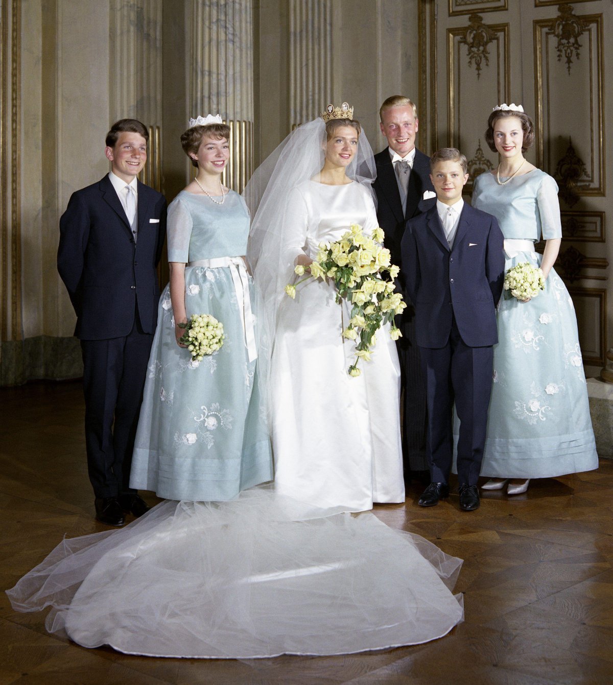 Prince Johann Georg of Hohenzollern and Princess Birgitta of Sweden are pictured with their bridal party after their civil wedding ceremony in Stockholm on May 25, 1961 (TT News Agency/Alamy)
