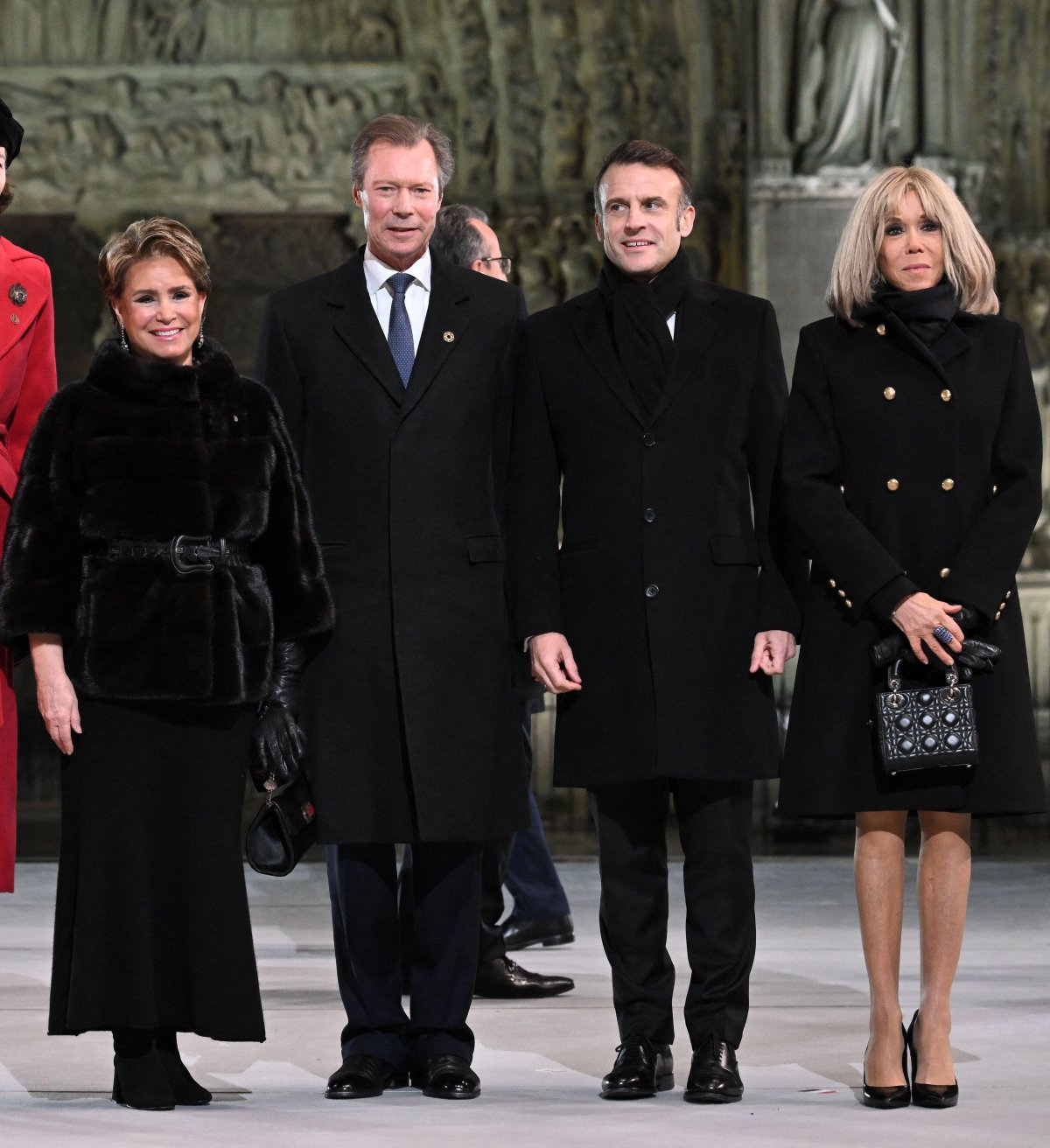 The Grand Duke and Grand Duchess of Luxembourg pose with President Emmanuel Macron and Brigitte Macron during the reopening ceremony for the Cathedral of Notre Dame in Paris on December 7, 2024 (Eliot Blondet/Abaca Press/Alamy)