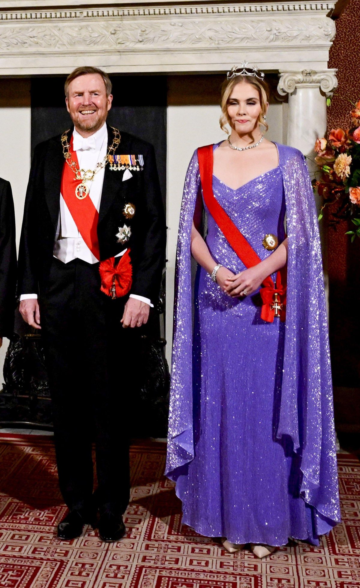 The King and Queen of the Netherlands, with the Princess of Orange, host a state banquet in honor of the President of Portugal in Amsterdam on December 10, 2024 (Patrick van Emst/NLBeeld/Alamy)