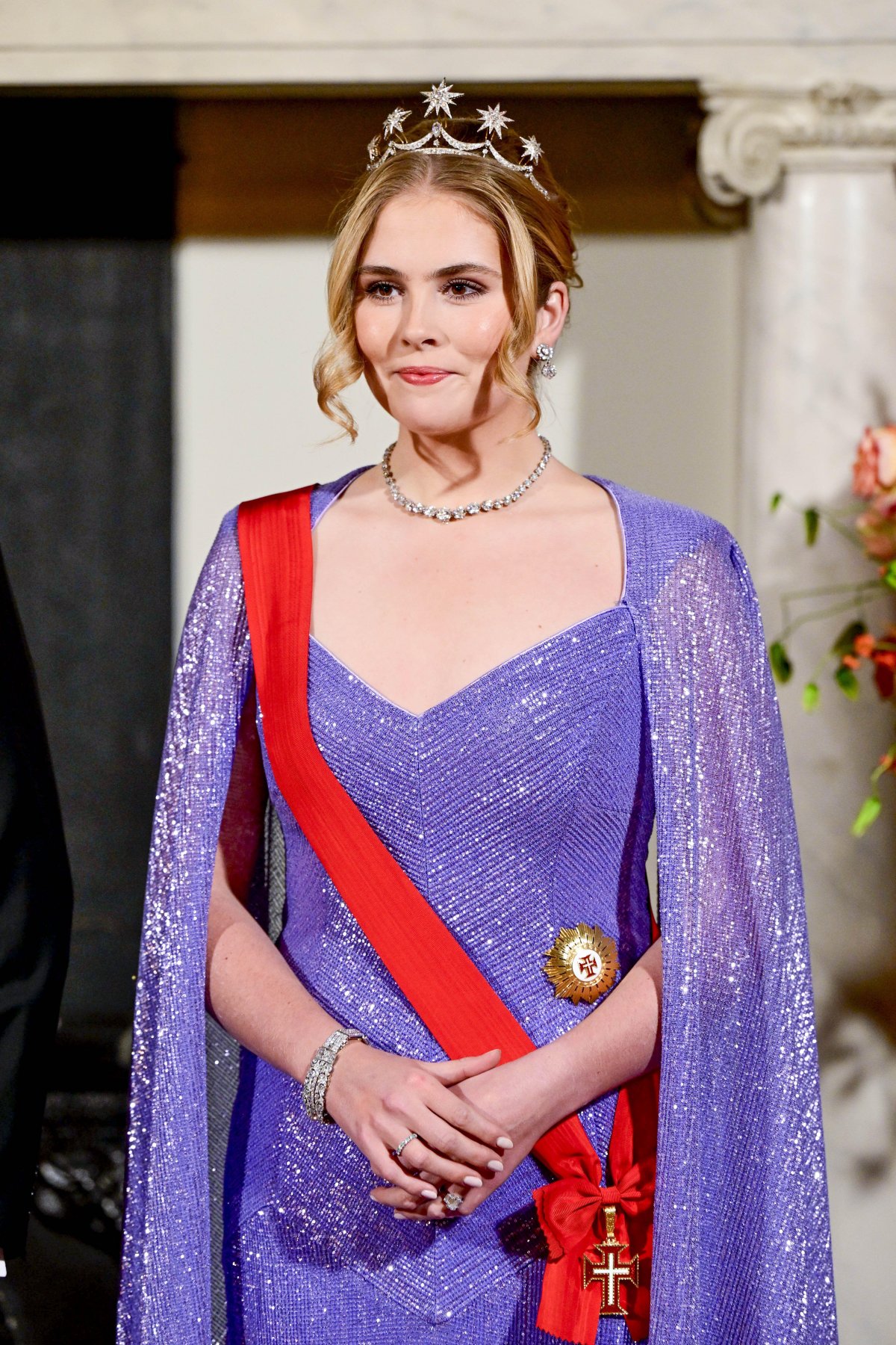 The King and Queen of the Netherlands, with the Princess of Orange, host a state banquet in honor of the President of Portugal in Amsterdam on December 10, 2024 (Patrick van Emst/NLBeeld/Alamy)