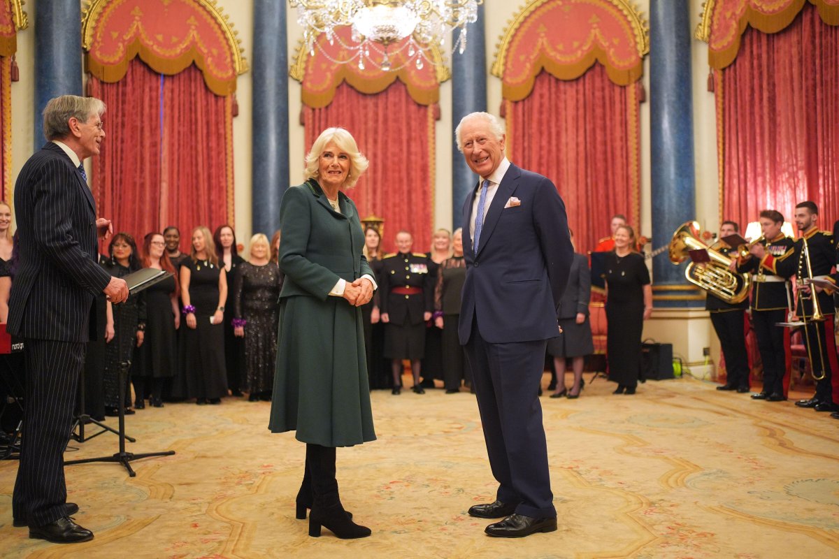The Military Wives Choirs perform for King Charles III and Queen Camilla at Buckingham Palace in London, on December 11, 2024 (Yui Mok/PA Images/Alamy)