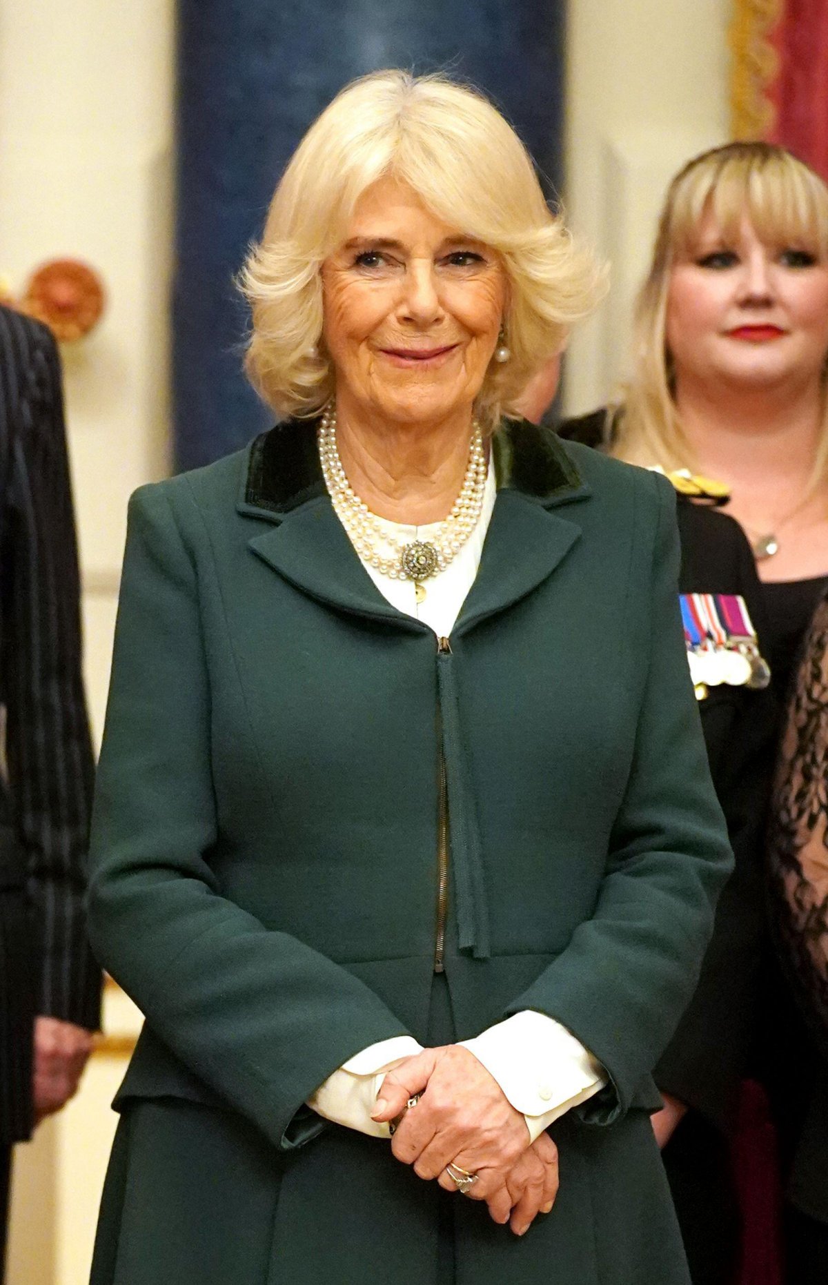 The Military Wives Choirs perform for King Charles III and Queen Camilla at Buckingham Palace in London, on December 11, 2024 (Yui Mok/PA Images/Alamy)