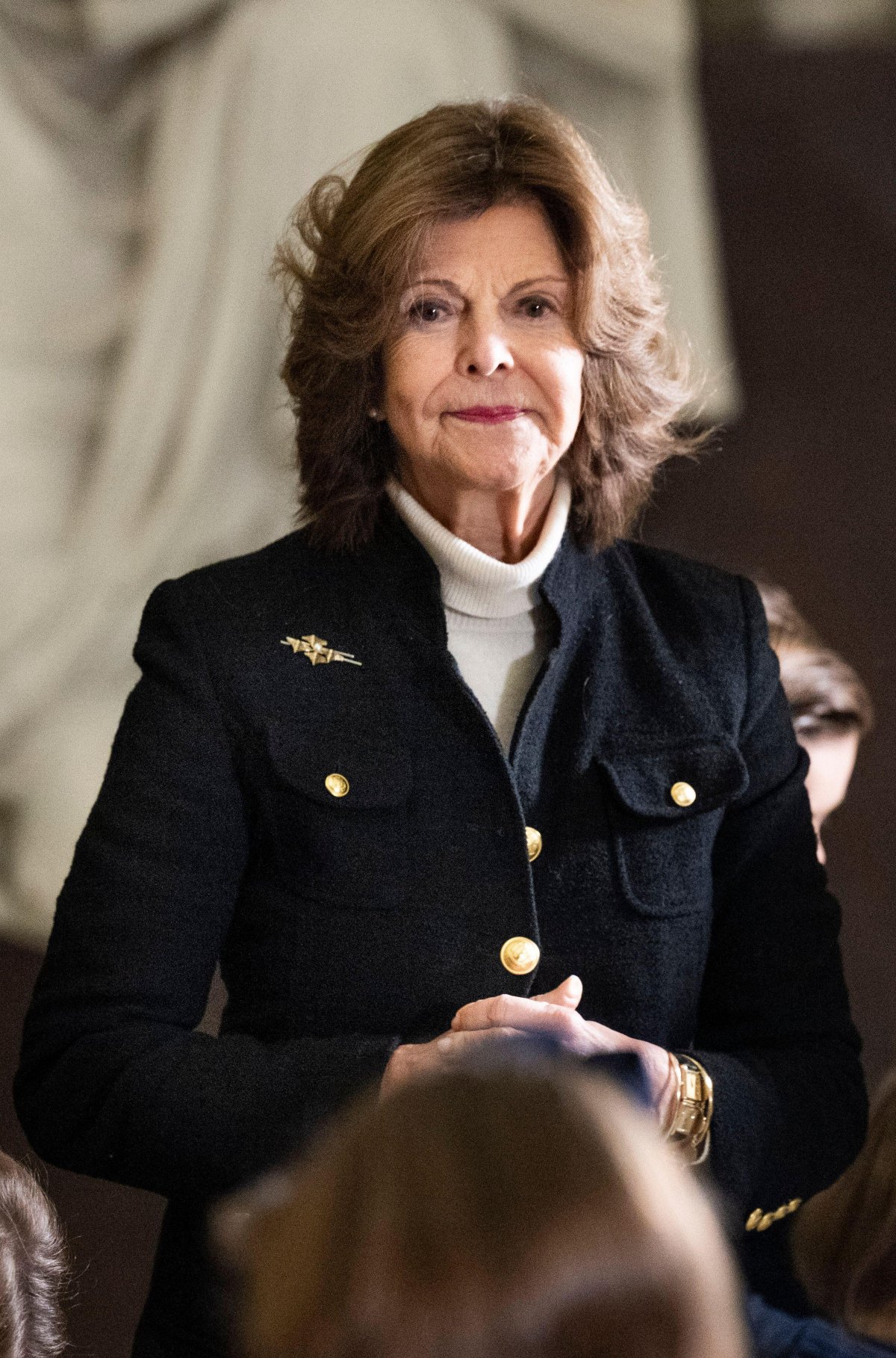The Queen of Sweden and her grandchildren receive this year's Christmas trees at the Royal Palace in Stockholm on December 16, 2024 (Pontus Lundahl/TT News Agency/Alamy)