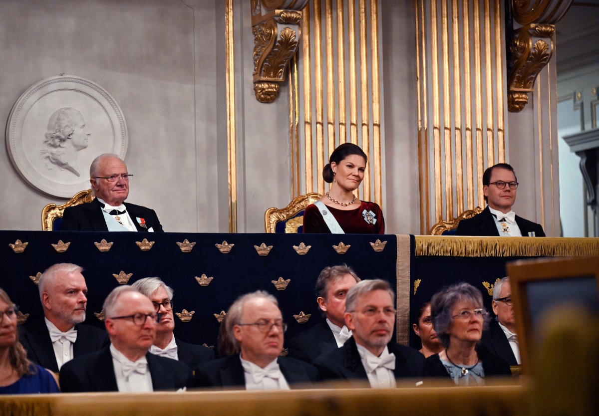 The King of Sweden, with Crown Princess Victoria and Prince Daniel, attends the Swedish Academy's annual Grand Ceremony at the Old Stock Exchange Building in Stockholm on December 20, 2024 (Pontus Lundahl/TT News Agency/Alamy)