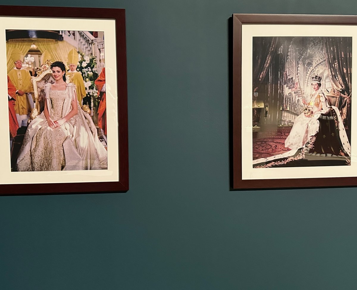 Photographs showing the coronation ensemble from The Princess Diaries films and Queen Elizabeth II's coronation are displayed as part of the "All That Glitters: The Crown Jewels of the Walt Disney Archives" exhibition at the Arlington Museum of Art, 2024 (Photo generously provided by Lady Maria)