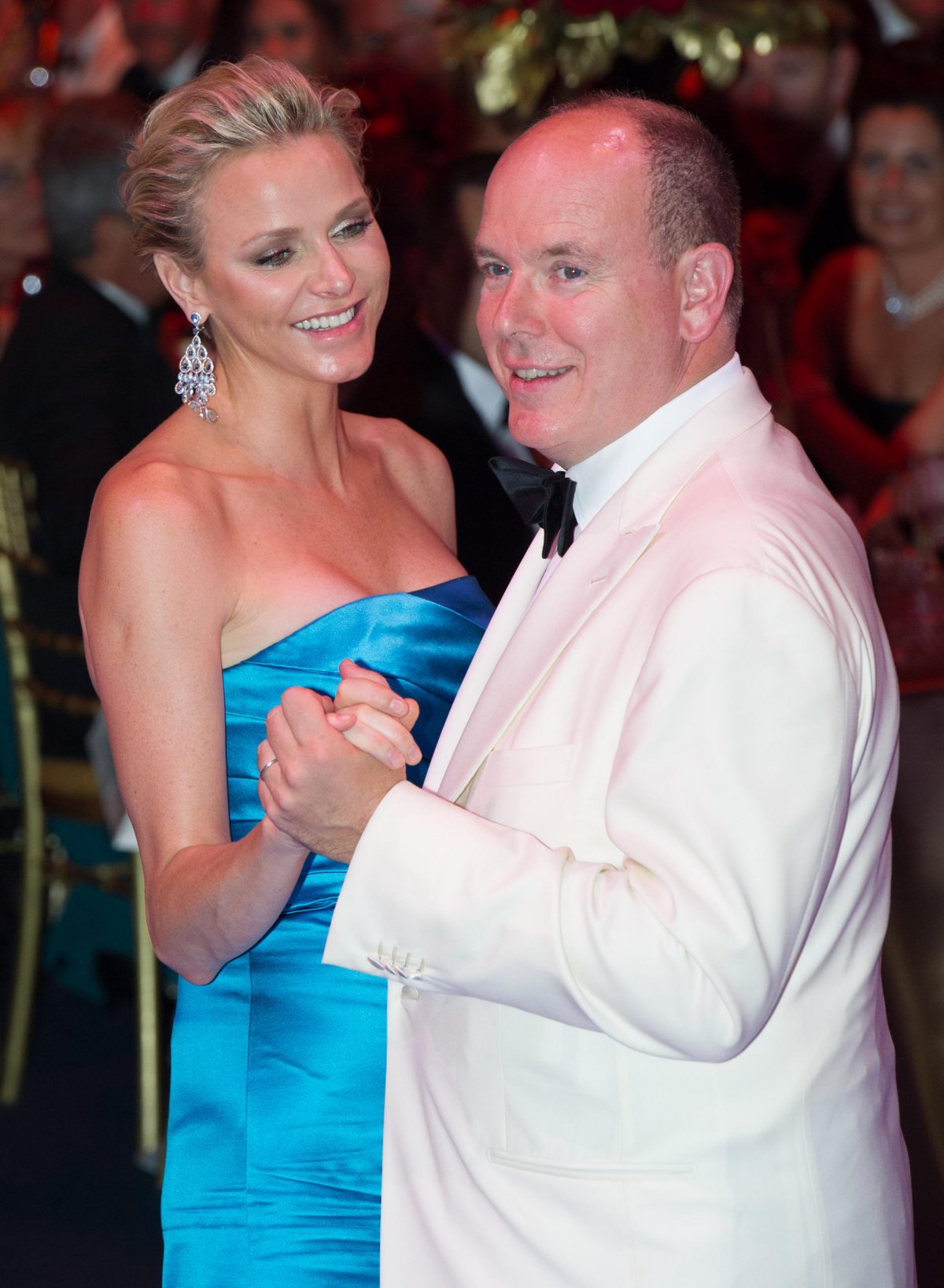 The Prince and Princess of Monaco dance during the 65th annual Red Cross Gala on August 2, 2013 (WENN/Alamy)