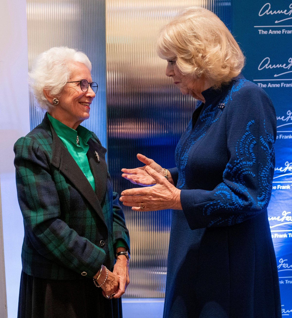 Queen Camilla speaks with Holocaust survivor Eva Clarke during a reception hosted by the Anne Frank Trust UK to mark Holocaust Memorial Day at the London Hilton, Park Lane on January 23, 2025 (Arthur Edwards/PA Images/Alamy)