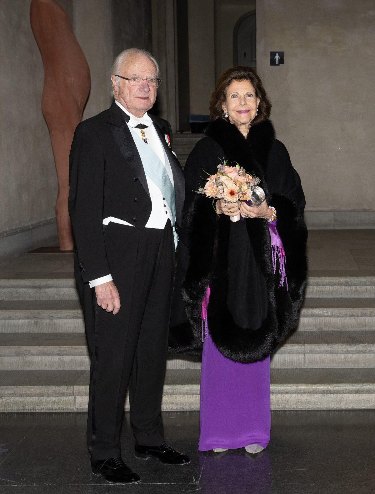 The King and Queen of Sweden attend the Academy of Forestry and Agriculture's ceremonial gathering at Stockholm City Hall on January 28, 2025 (Fredrik Sandberg/TT News Agency/Alamy)