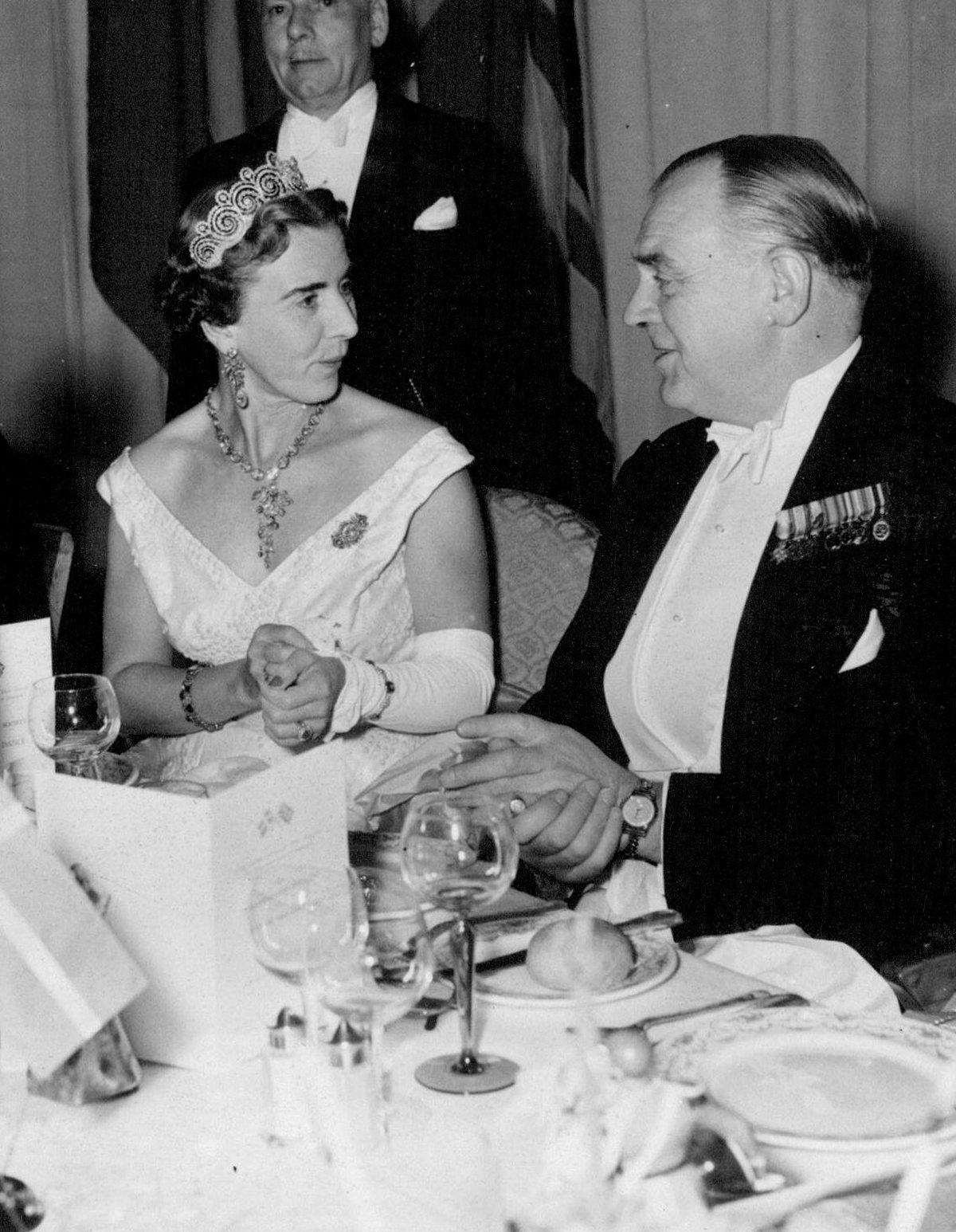 Queen Ingrid of Denmark speaks with Gwily Lloyd-George, Britain's Home Secretary, during the Anglo-Danish Society's annual dinner at the Mayfair Hotel in London on September 21, 1955 (SuperStock/Alamy)