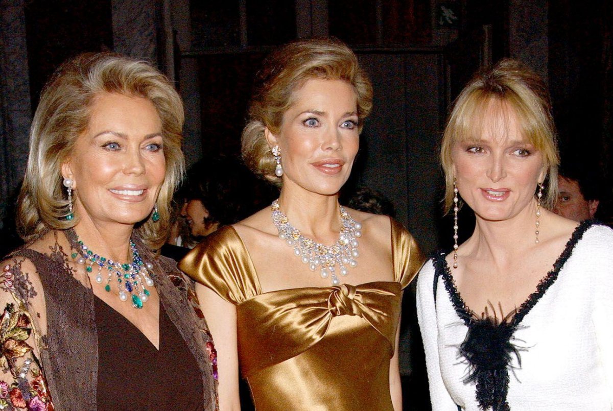 Renate Thyssen-Henne, Begum Inaara Aga Khan, and Claude Chirac attend a charity gala dinner supporting cancer research funding at the Palace of Versailles on February 9, 2004 (Serge Arnal/Abaca Press/Alamy)