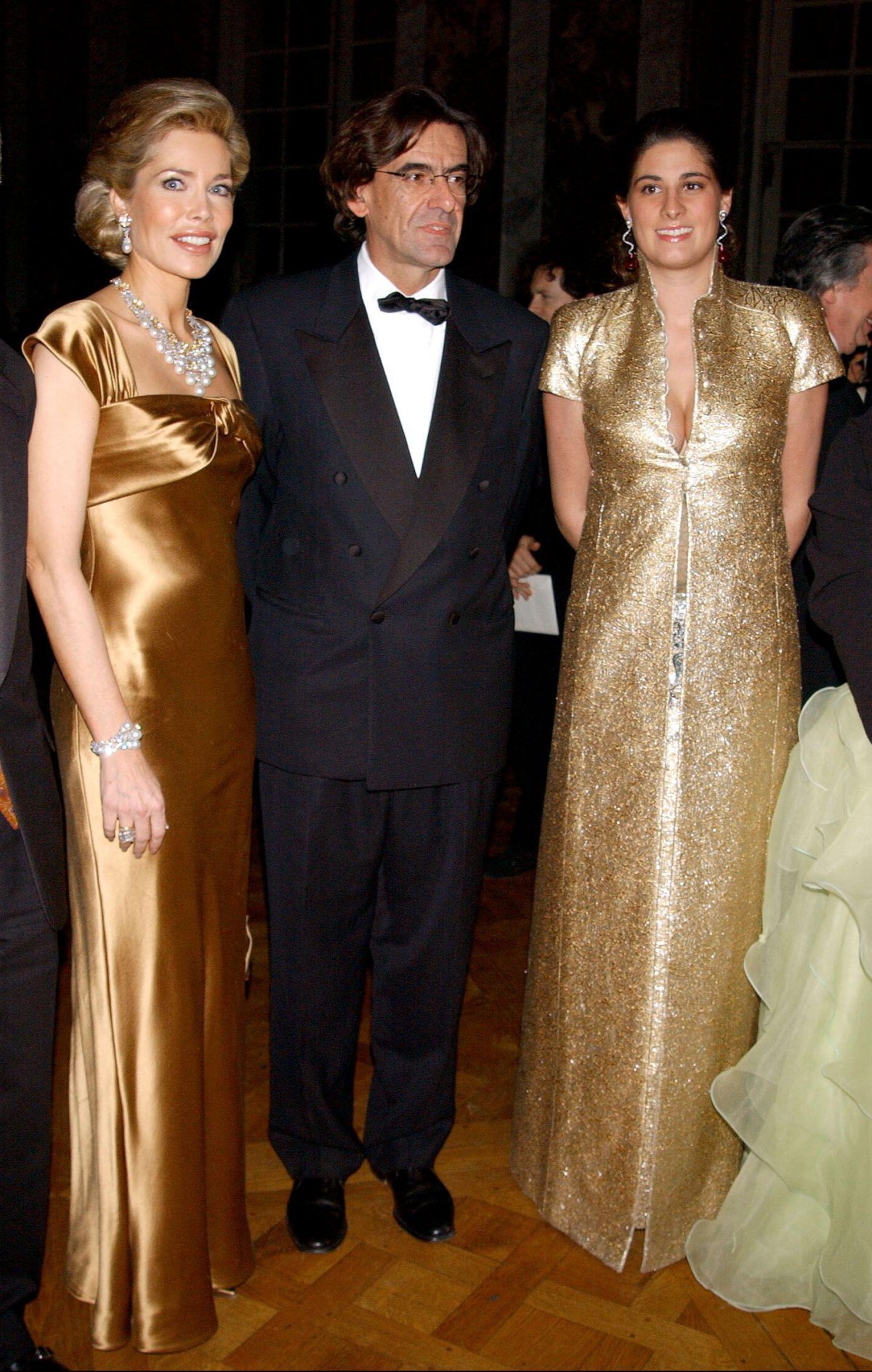 Begum Inaara Aga Khan, with French Education Minister Luc Ferry and his wife, Marie-Caroline, attend a charity gala dinner supporting cancer research funding at the Palace of Versailles on February 9, 2004 (Serge Arnal/Abaca Press/Alamy)