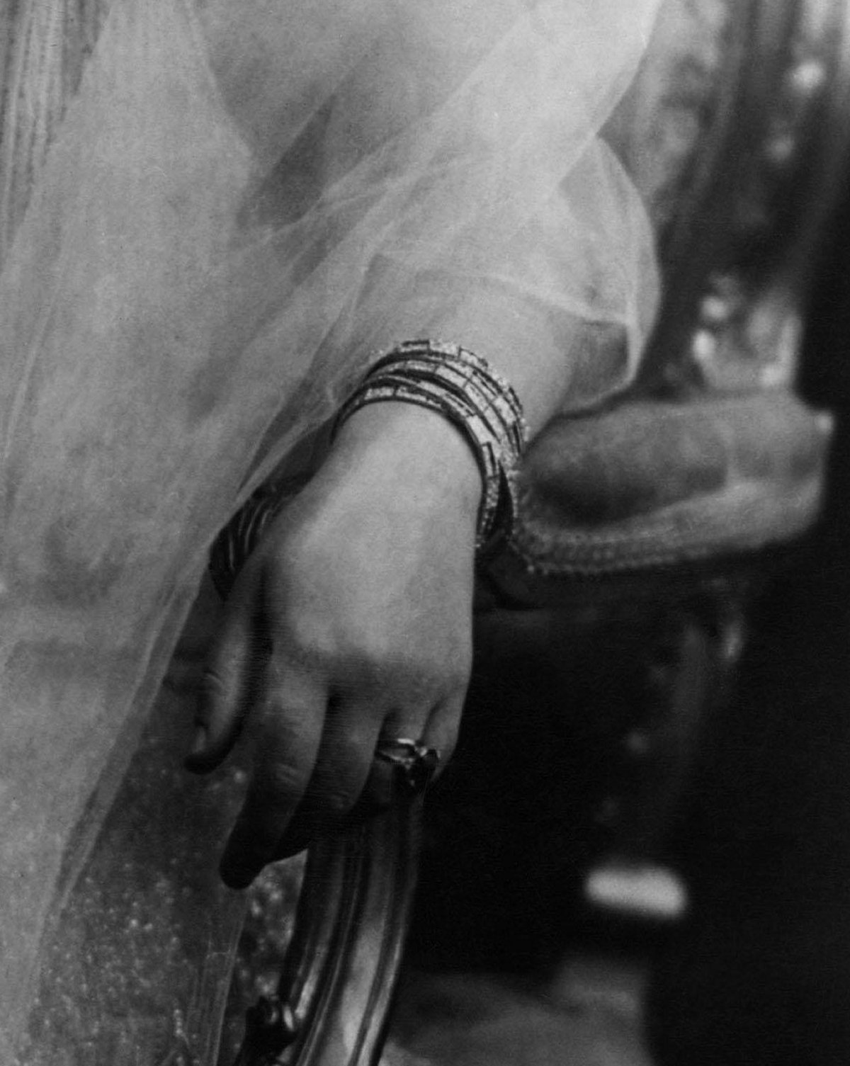 Detail from a formal photograph of the Duchess of York, ca. 1926 (Everett Collection/Alamy)