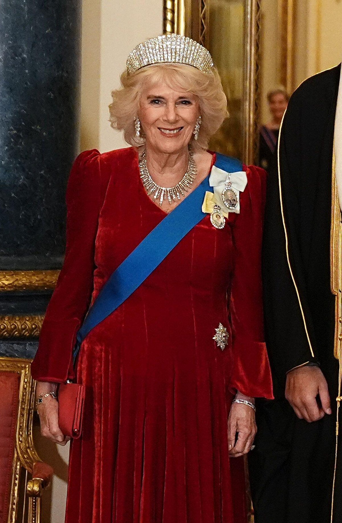 Queen Camilla attends a state banquet in honor of the visiting Emir of Qatar at Buckingham Palace on December 3, 2024 (Aaron Chown/PA Images/Alamy)