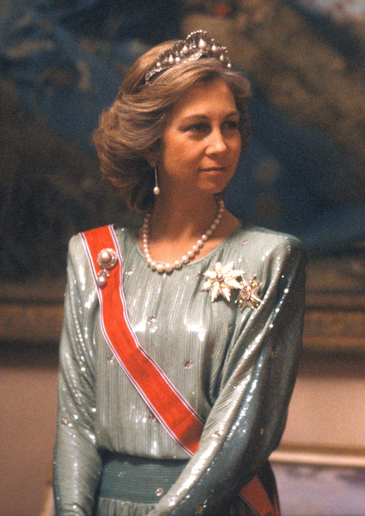 Queen Sofia of Spain is pictured during a state banquet given in honor of King Olav V of Norway at the Royal Palace in Madrid, March 1984 (Inge Gjellesvik/NTB/Alamy)