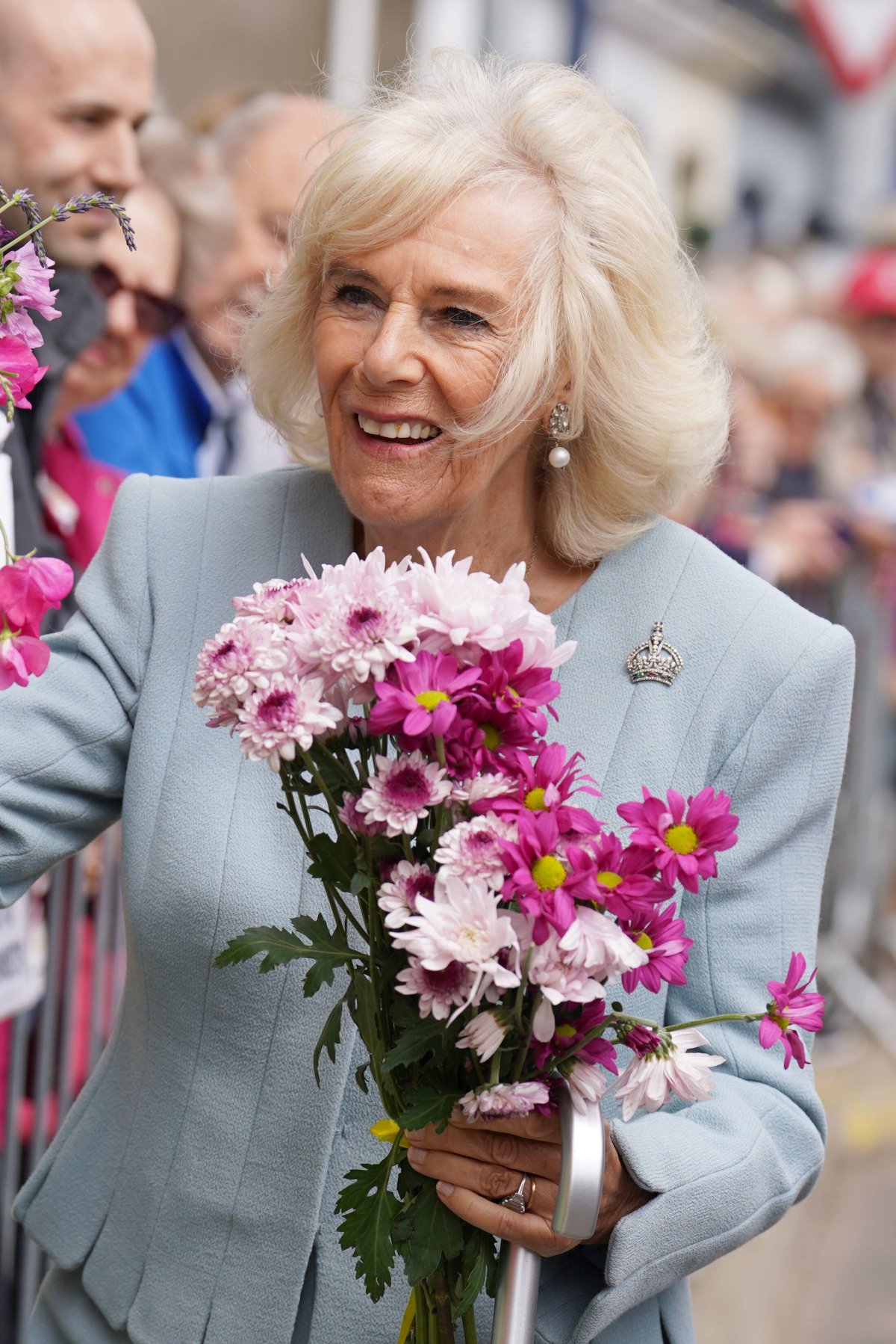 Queen Camilla tours the market square in Selkirk during Holyrood Week on July 6, 2023 (Andrew Milligan/PA Images/Alamy)