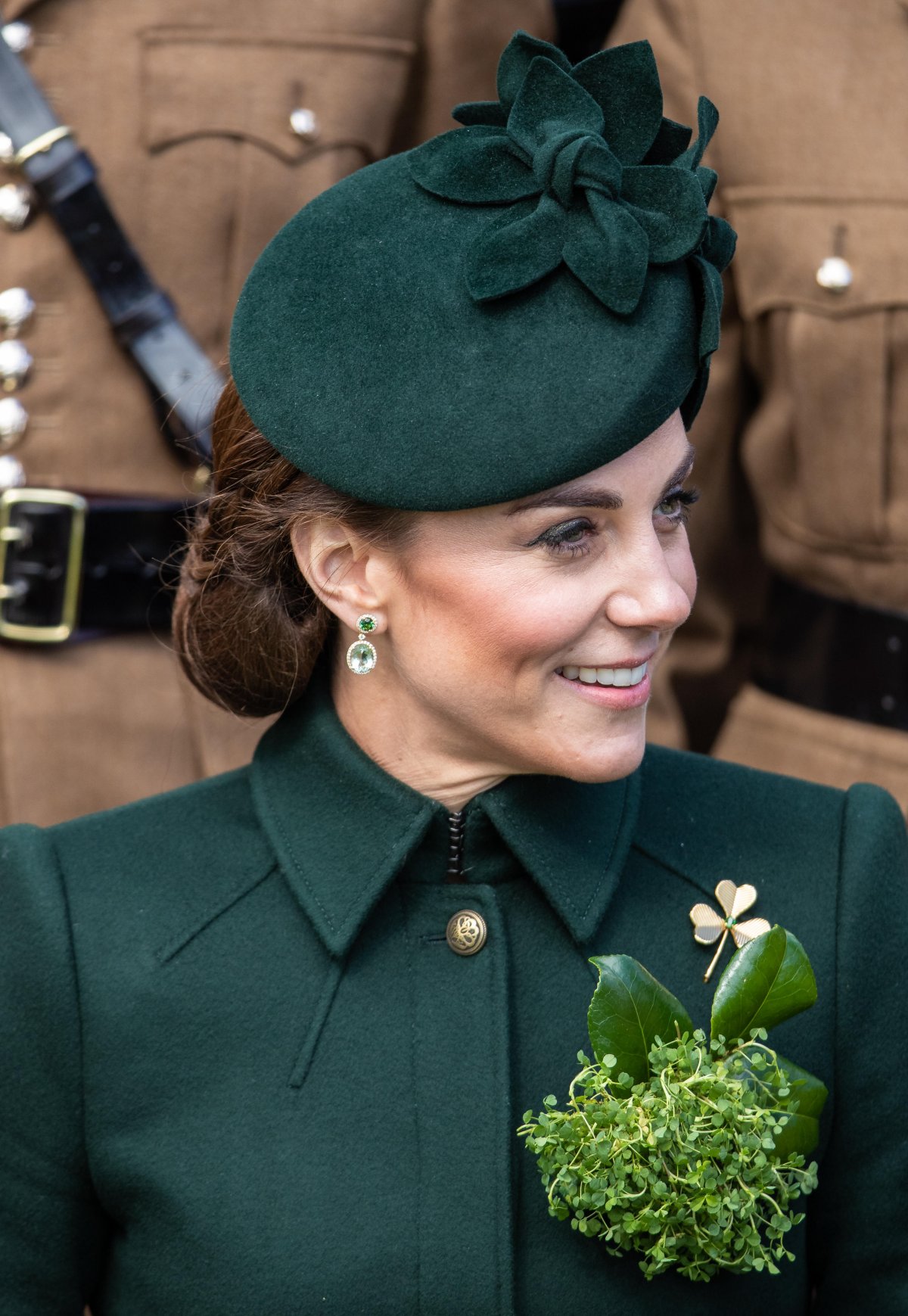 The Duchess of Cambridge presents shamrocks to the Irish Guards on St. Patrick's Day at Cavalry Barracks in Hounslow on March 17, 2019 (WENN/Alamy)
