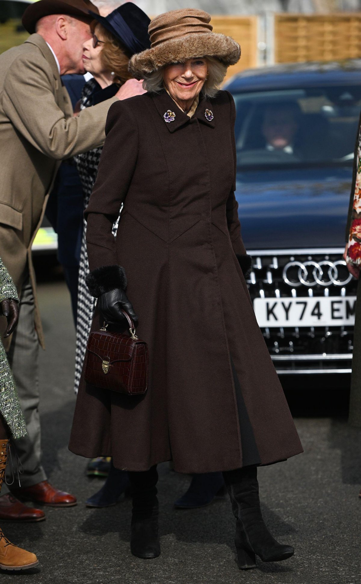 Queen Camilla attends the second day of the Cheltenham Festival in Gloucestershire on March 12, 2025 (Eddie Mulholland/PA Images/Alamy)
