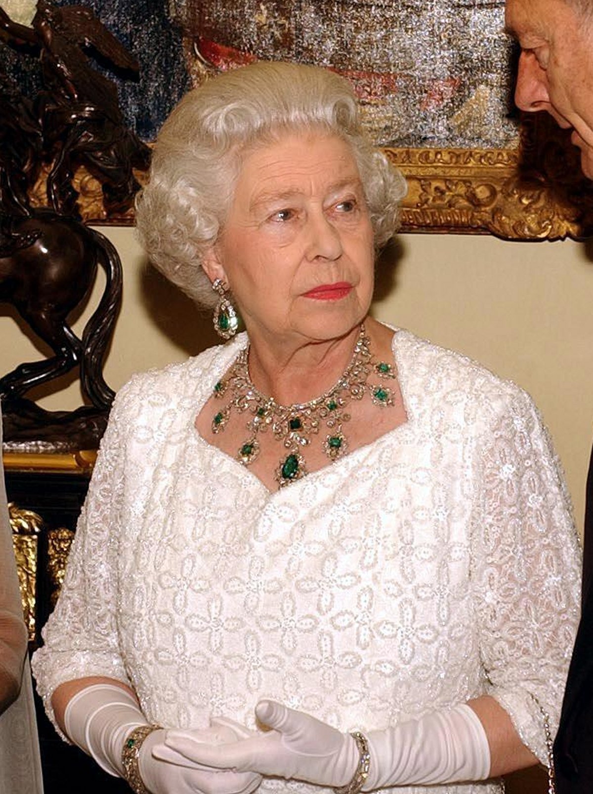 Queen Elizabeth II speaks with French President Jacques Chirac before a state banquet at Windsor Castle on November 18, 2004 (John Stillwell/PA Images/Alamy)