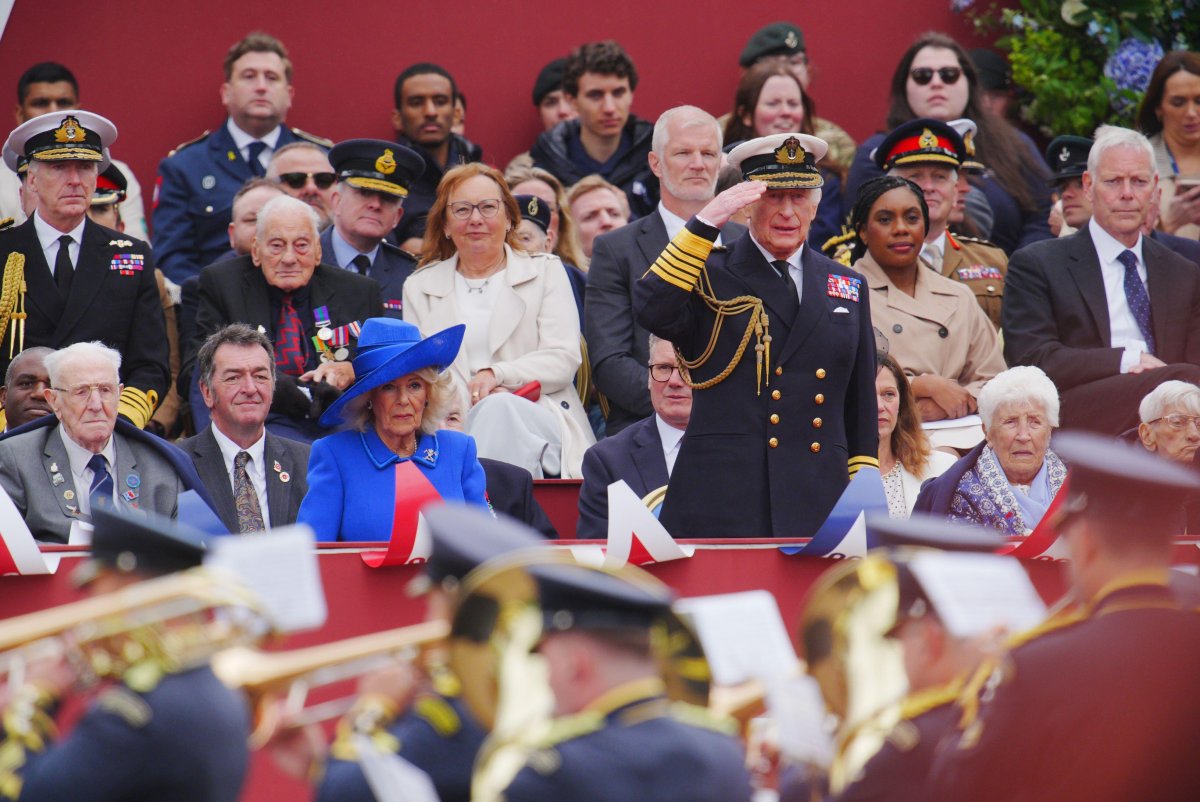 King Charles III takes the salute from the military procession marking the 80th anniversary of VE Day, and in honor of those who served during the Second World War, at Buckingham Palace in London on May 5, 2025 (Ben Birchall/PA Images/Alamy)