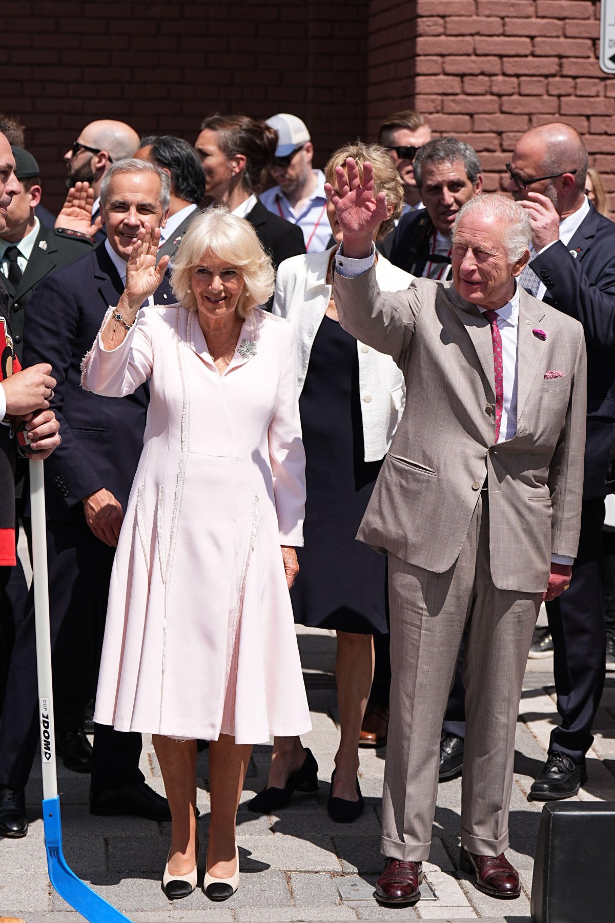 King Charles III and Queen Camilla join Prime Minister Mark Carney for a community event at Lansdowne Park in Ottawa on May 26, 2025 (Aaron Chown/PA Images/Alamy)