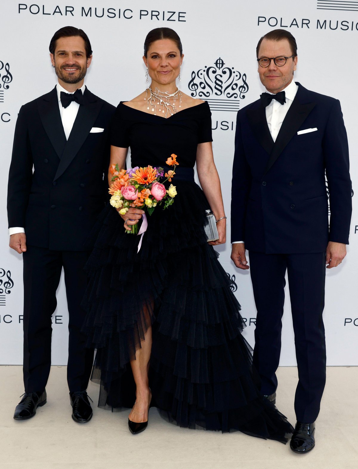 The Crown Princess of Sweden, with Prince Daniel and Prince Carl Philip, arrives at the Grand Hotel in Stockholm for the Polar Music Prize presentation on May 27, 2025 (Stefan Jerrevång/TT News Agency/Alamy)