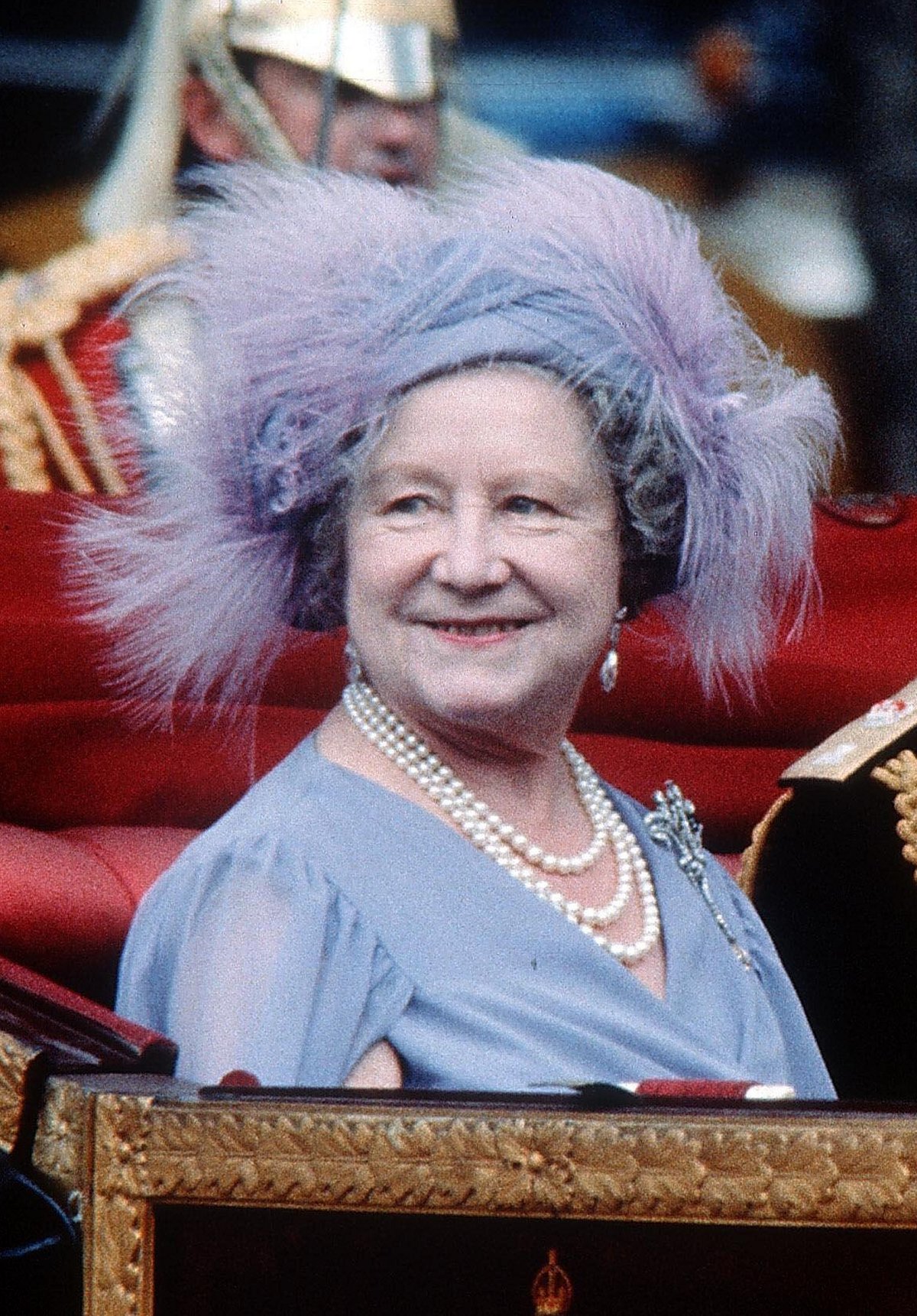 The Queen Mother rides in a carriage to St. Paul's Cathedral ahead of a service of thanksgiving for her 80th birthday on July 15, 1980 (Zuma Press/Alamy)