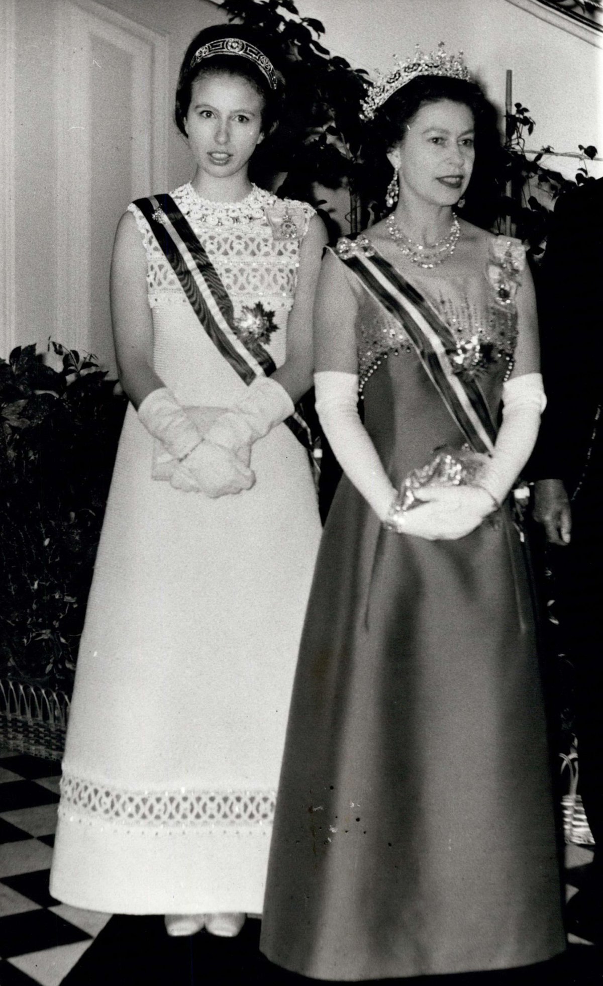 Queen Elizabeth II, with Princess Anne, hosts a return banquet at the British Embassy in Vienna on May 7, 1969 (Keystone Press/Zuma Press/Alamy)