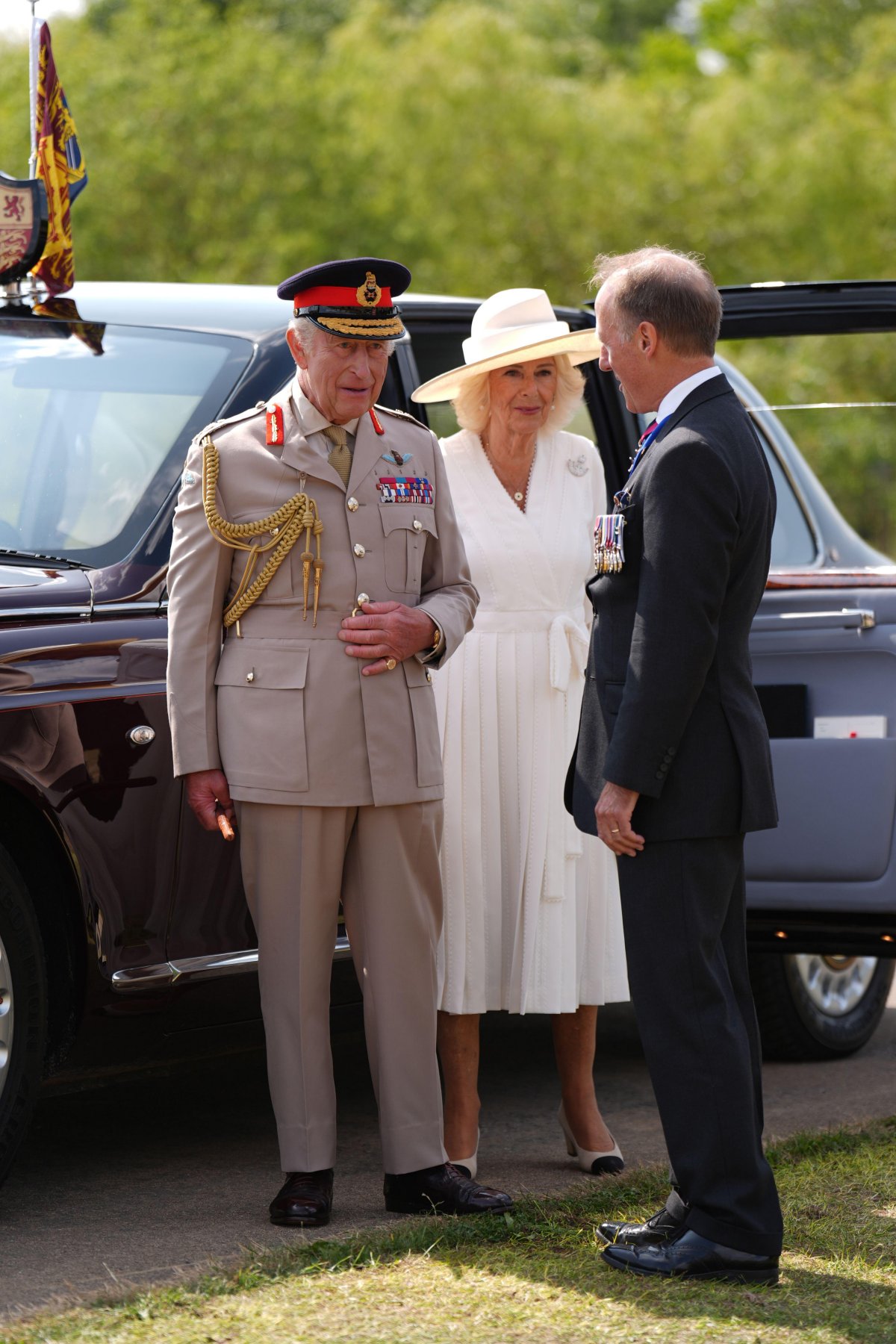 King Charles III and Queen Camilla arrive at the National Memorial Arboretum in Staffordshire for a service of remembrance to mark the 80th anniversary of VJ Day on August 15, 2025 (Joe Giddens/PA Images/Alamy)