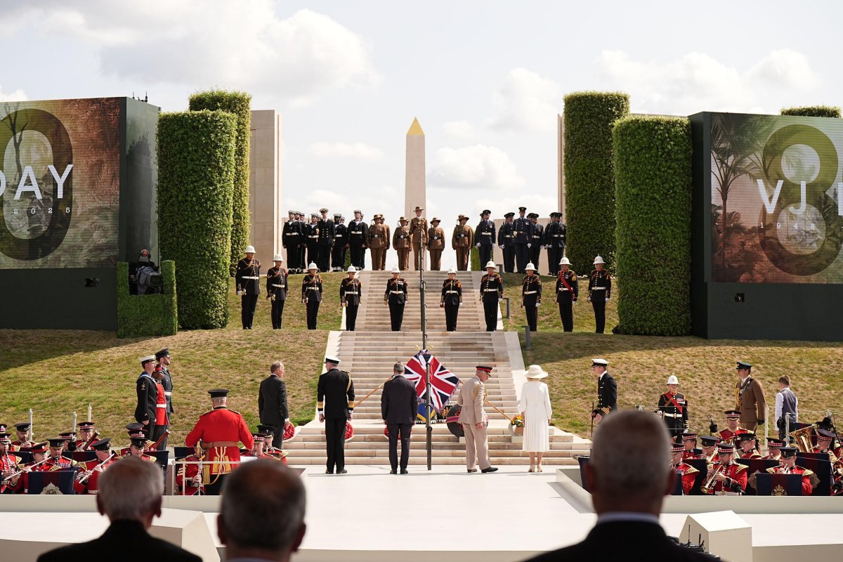 King Charles III and Queen Camilla attend a service of remembrance to mark the 80th anniversary of VJ Day at the National Memorial Arboretum in Staffordshire on August 15, 2025 (Aaron Chown/PA Images/Alamy)