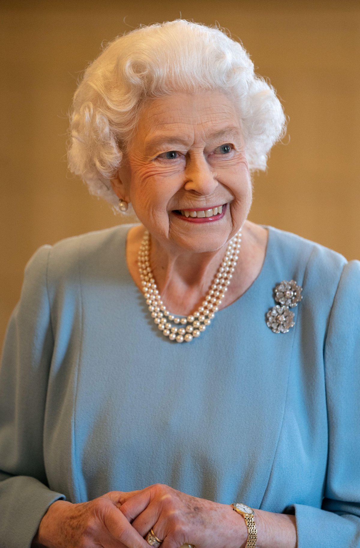 Queen Elizabeth II attends a reception at Sandringham House with representatives from local community groups to celebrate the start of the Platinum Jubilee on February 5, 2022 (Joe Giddens/PA Images/Alamy)