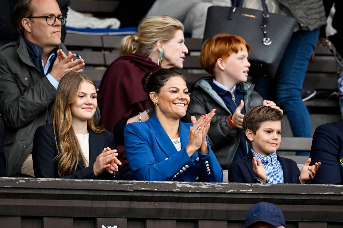 Crown Princess Victoria of Sweden, with Princess Estelle and Prince Oscar, attends the Finnkampen athletics meet at Stockholm Stadium on August 23, 2025 (Pontus Lundahl/TT News Agency/Alamy)