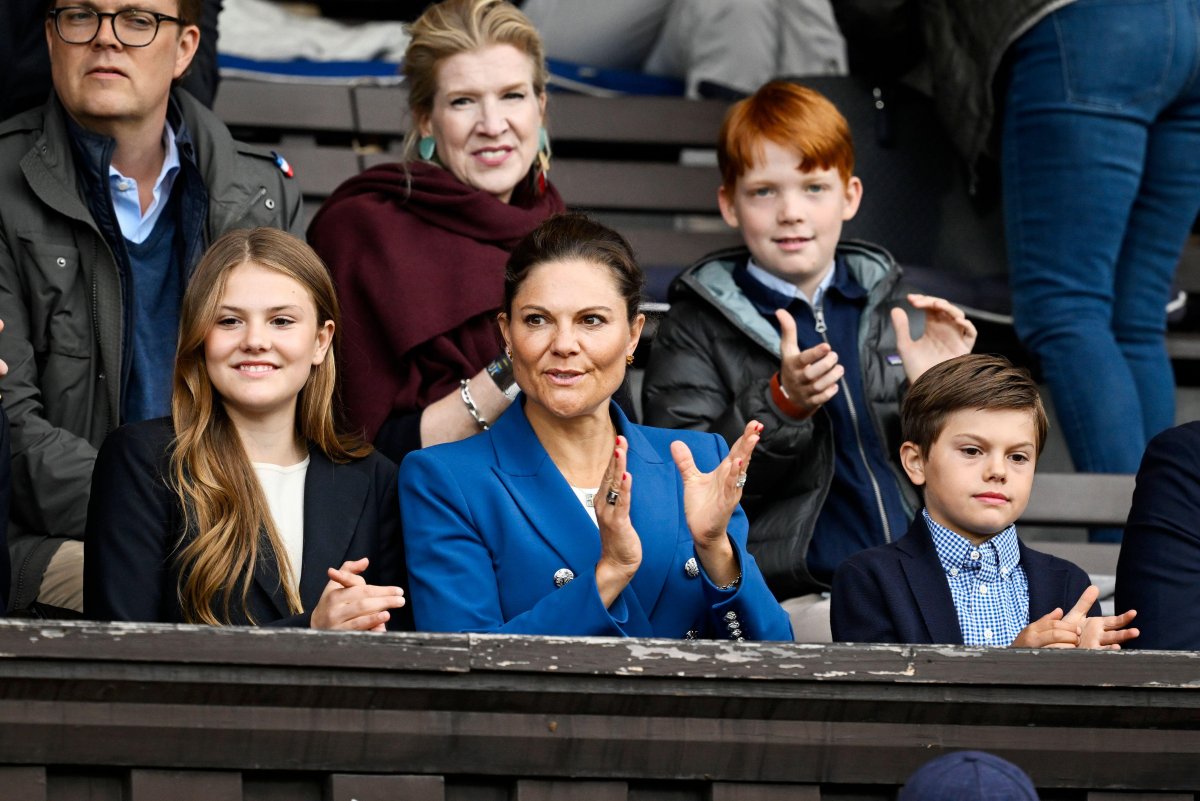 Crown Princess Victoria of Sweden, with Princess Estelle and Prince Oscar, attends the Finnkampen athletics meet at Stockholm Stadium on August 23, 2025 (Pontus Lundahl/TT News Agency/Alamy)
