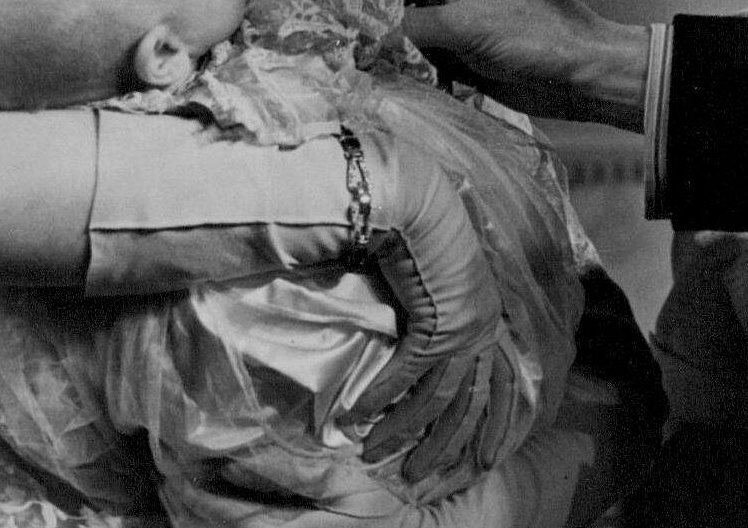 Princess Elizabeth (holding Princess Anne) is photographed during the christening of the baby princess at Buckingham Palace in London on October 21, 1950 (SuperStock/Alamy)