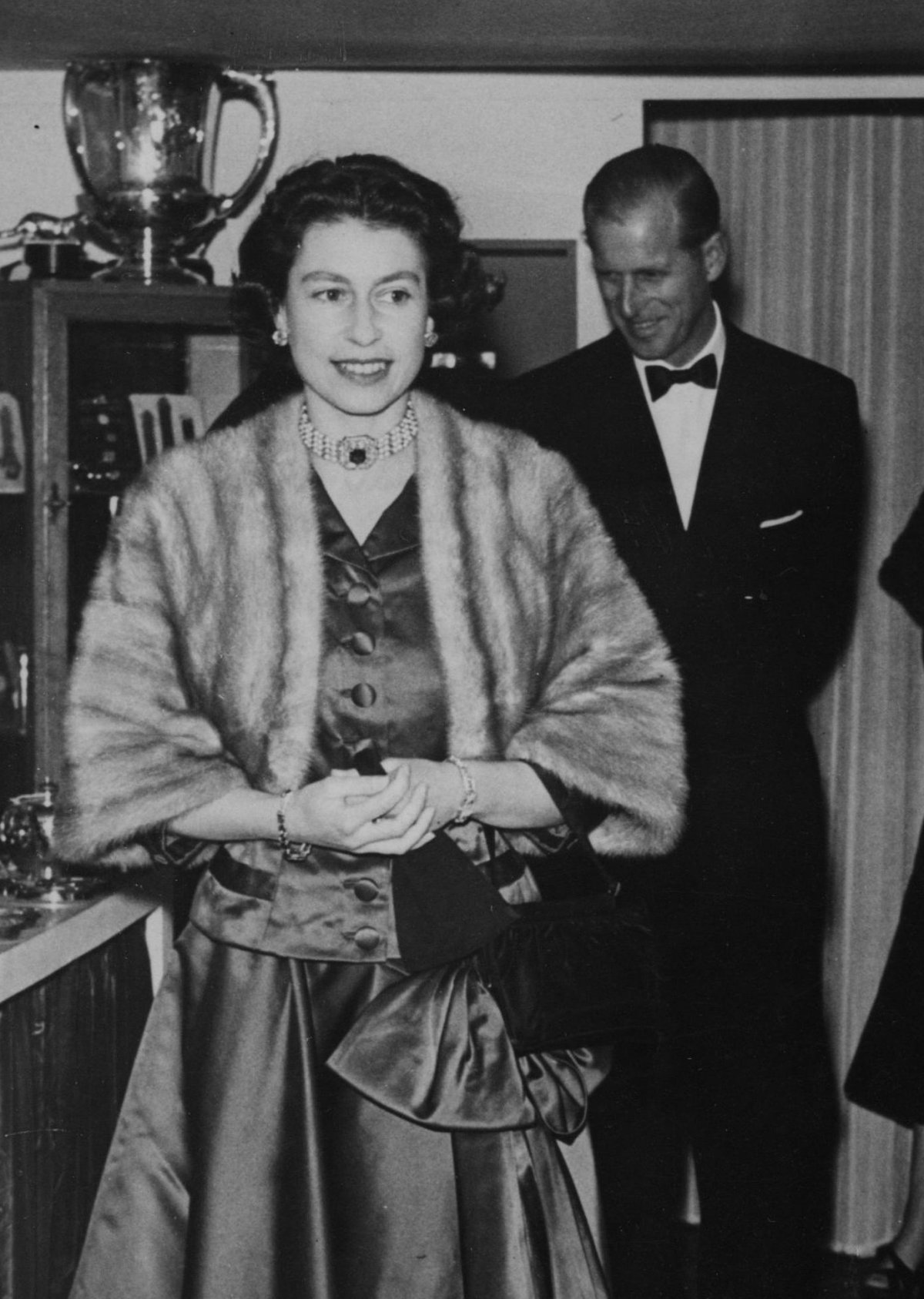 Queen Elizabeth II and the Duke of Edinburgh attend the Horse of the Year Show in London, October 1956 (PA Images/Alamy)