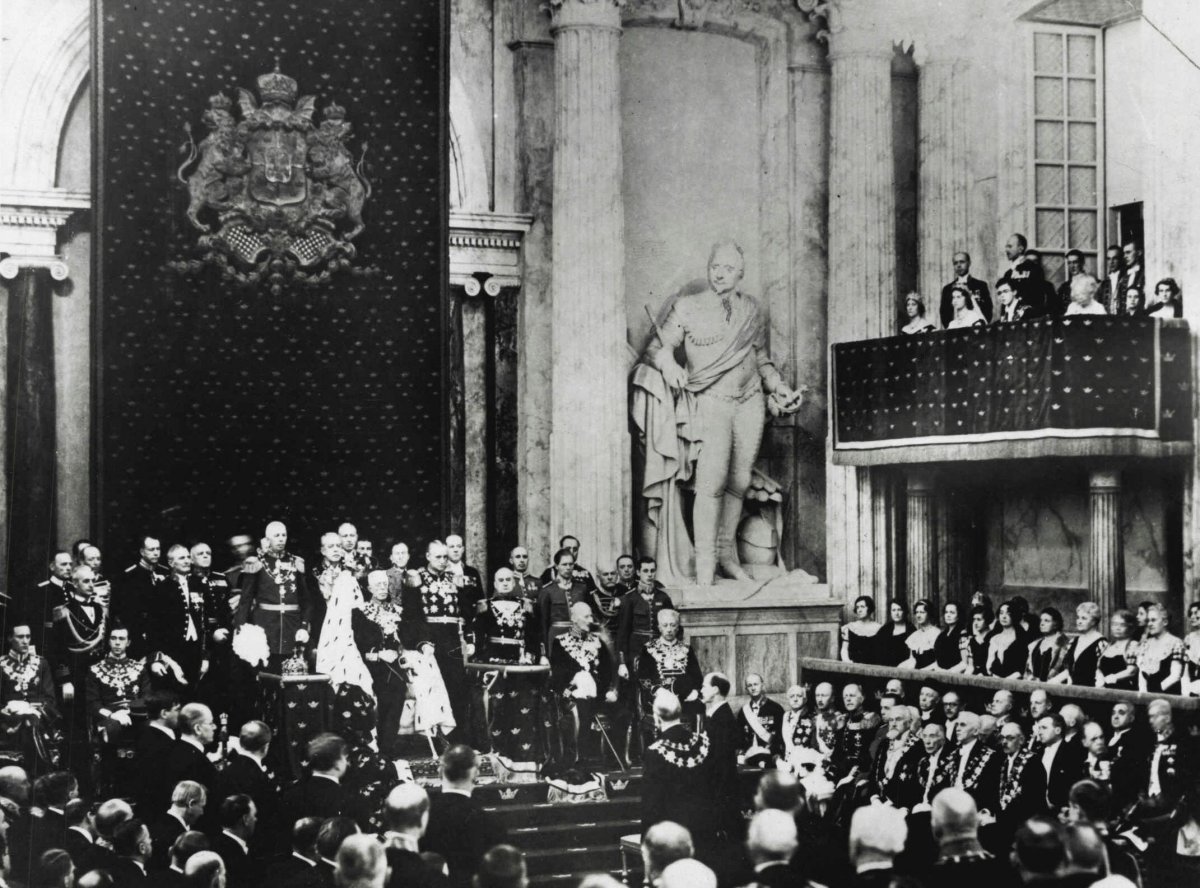 King Gustaf V of Sweden sits on the throne during the solemn opening of the Riksdag in the the Hall of State at the Royal Palace in Stockholm on January 11, 1935 (SuperStock/Alamy)